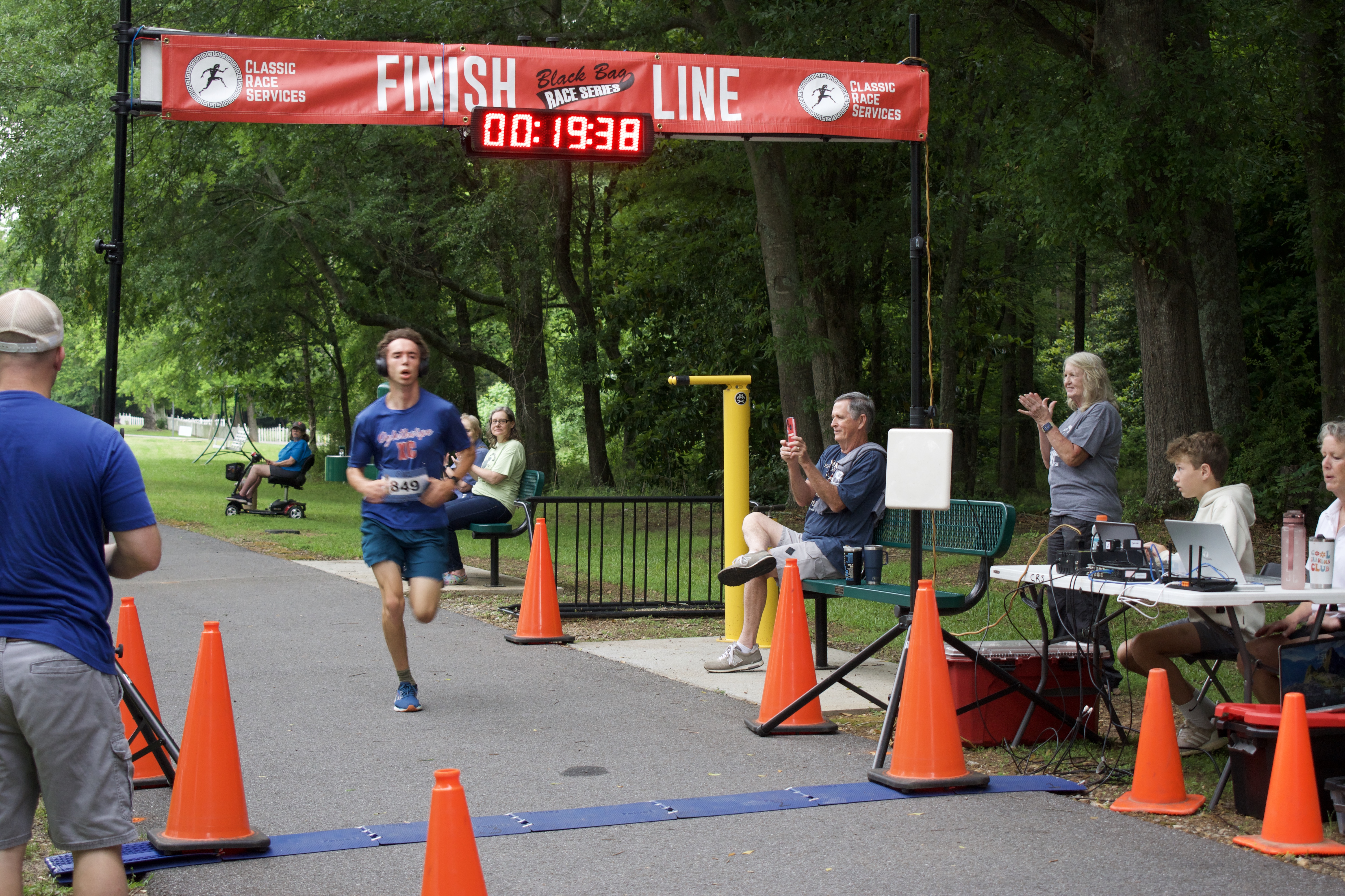 Cory Tillman, who will be a senior at Oglethorpe County High School in the fall, wins the Maxeys Model Mile 5K on Saturday. He finished with a time of 19 minutes, 40 seconds. (Photo/Emma Greene)