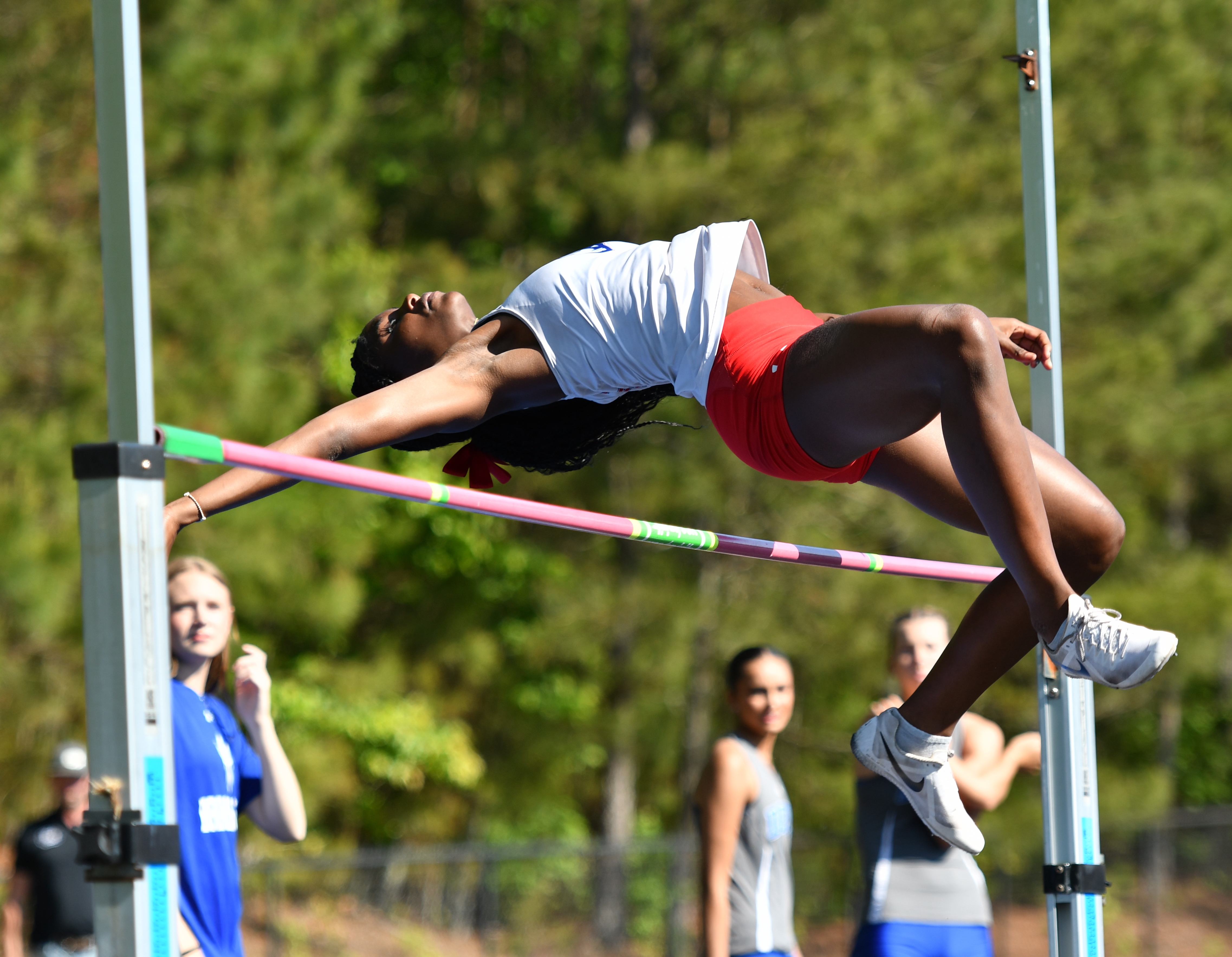 Kenzie Henderson tied for the top high jump at the Class A Division I sectional on Monday to advance to the state meet. She’s won three straight high jump state titles. (Photo/Wade Cheek)