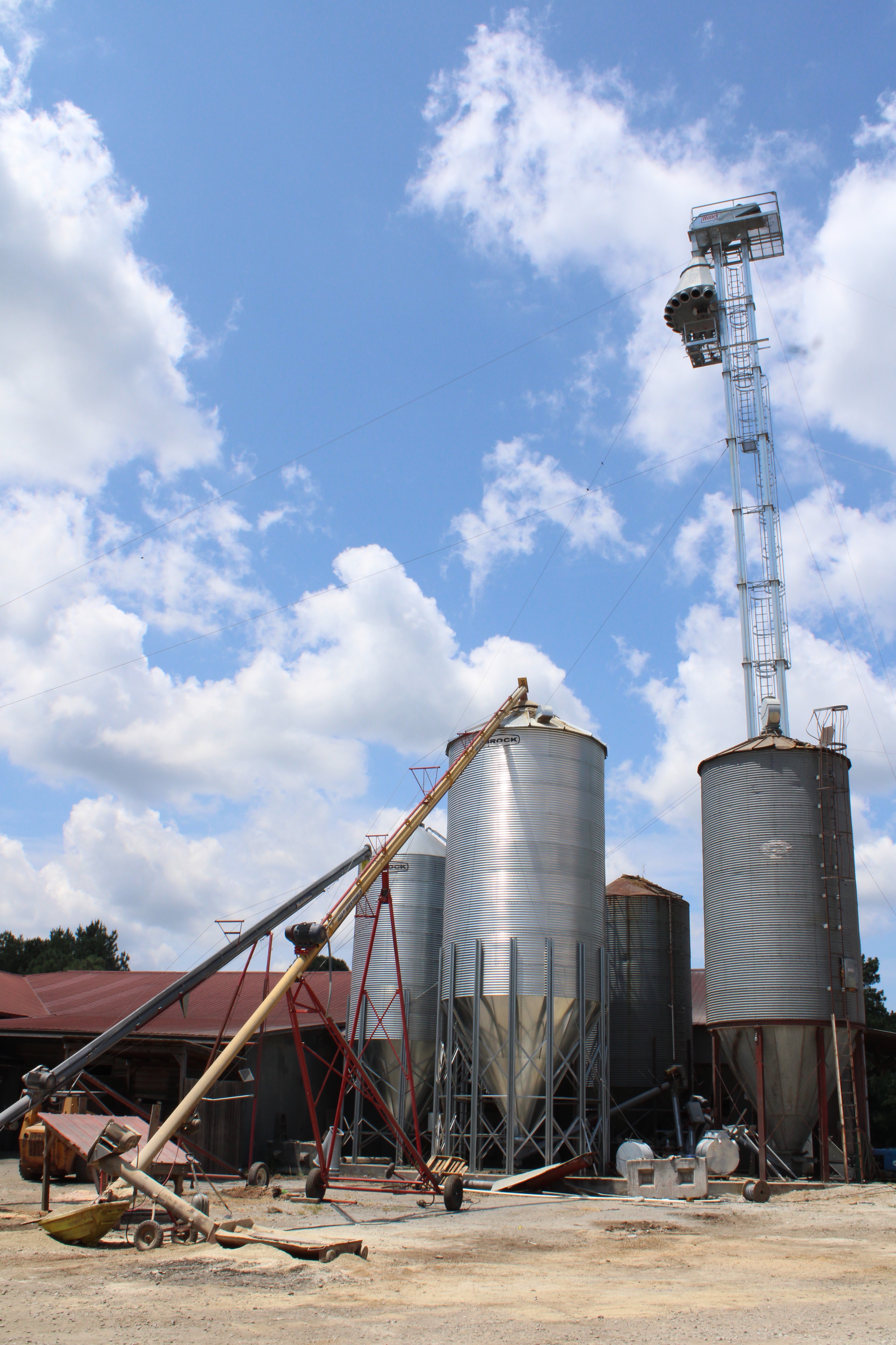 The new grain elevator and storage bins outside of Oglethorpe Feed and Hardware Supply feature a 125-foot tall elevator that’s still under construction, but is expected to be running sometime this month. (Photo/Elizabeth Kim)