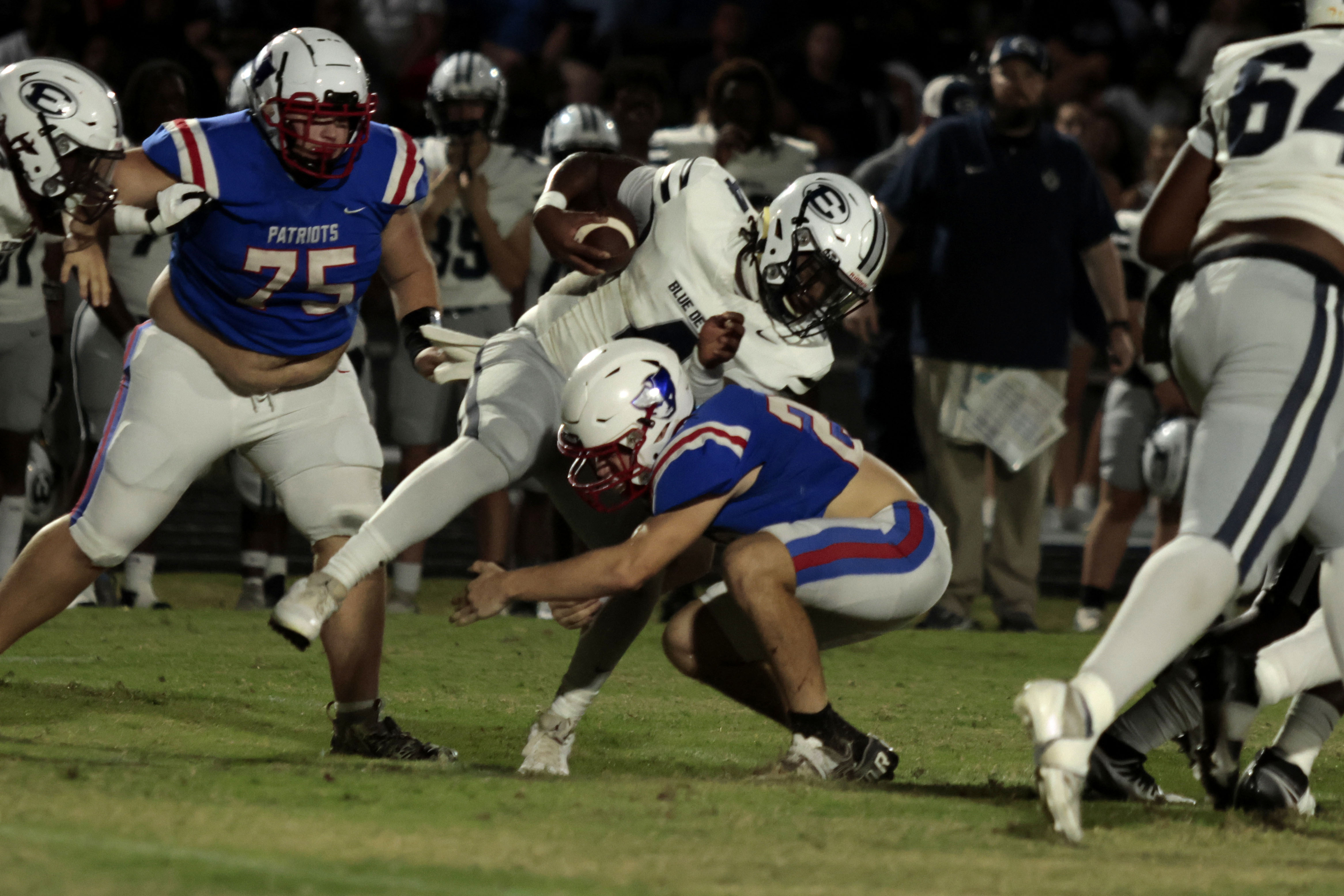 ​​Oglethorpe County’s Keagan Moats tackles Elbert County’s Jayvyn Hickman during a game last season. Moats returns as one of the Patriots’ starting linebackers this fall. (Photo/Adam Walters)