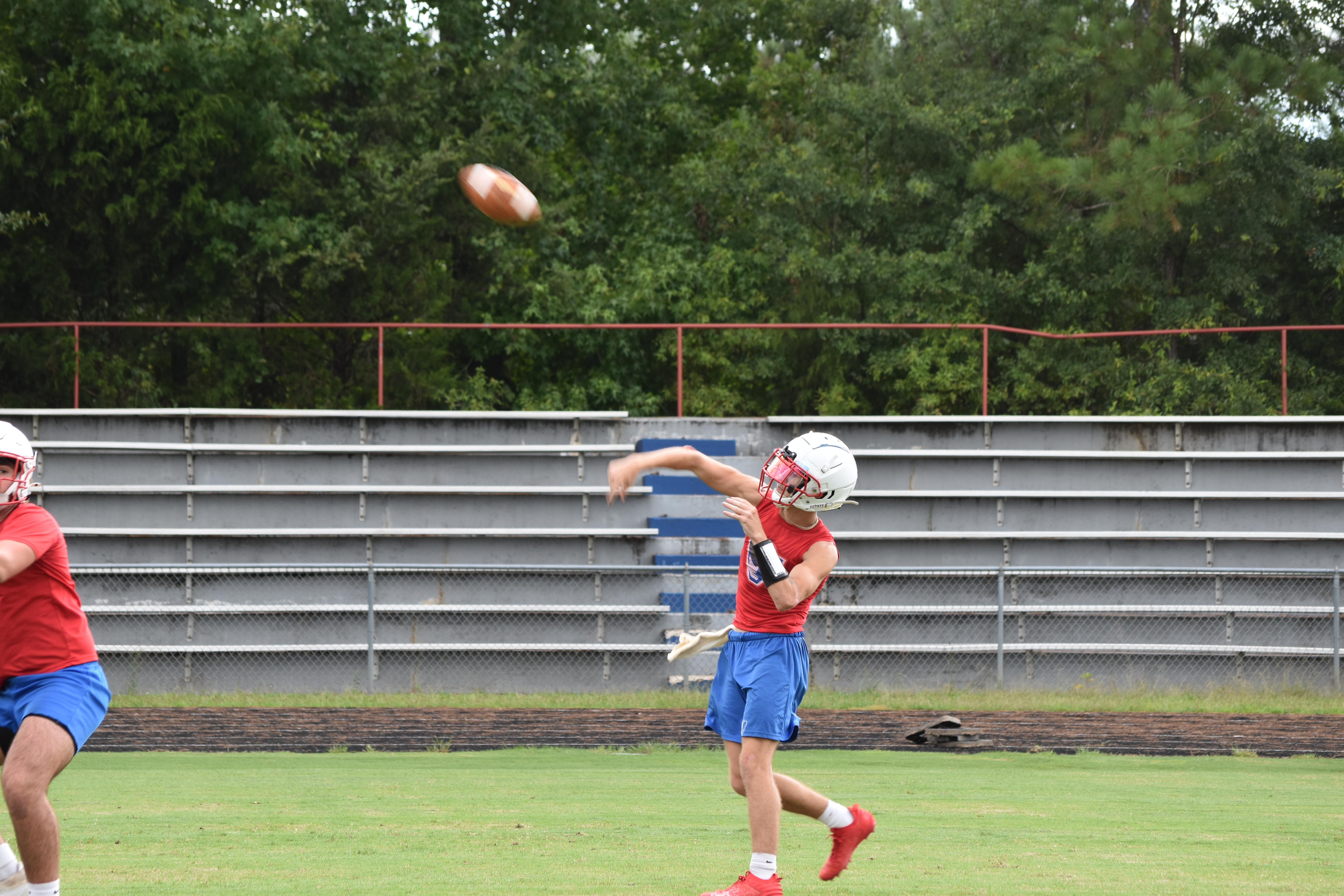 Senior Caden Hartrum returns to start at quarterback for the Patriots this year after moving from receiver during last season. (Photo/Emma Greene)
