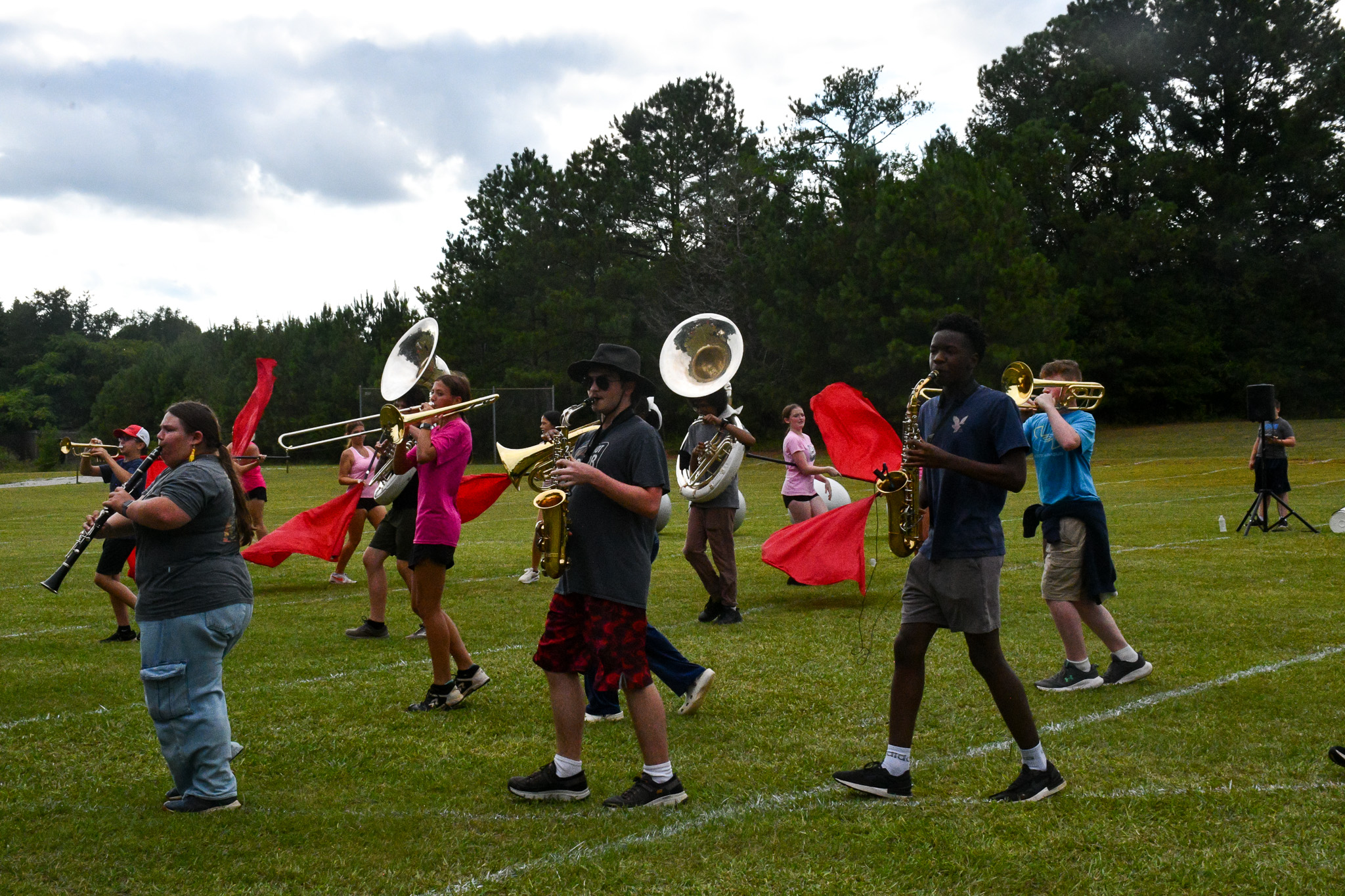The Oglethorpe County High School marching band practices in early August, heading into the football season. The band will perform a space-themed show called “One Small Step” this year. (Photo/Jennifer Xia)
