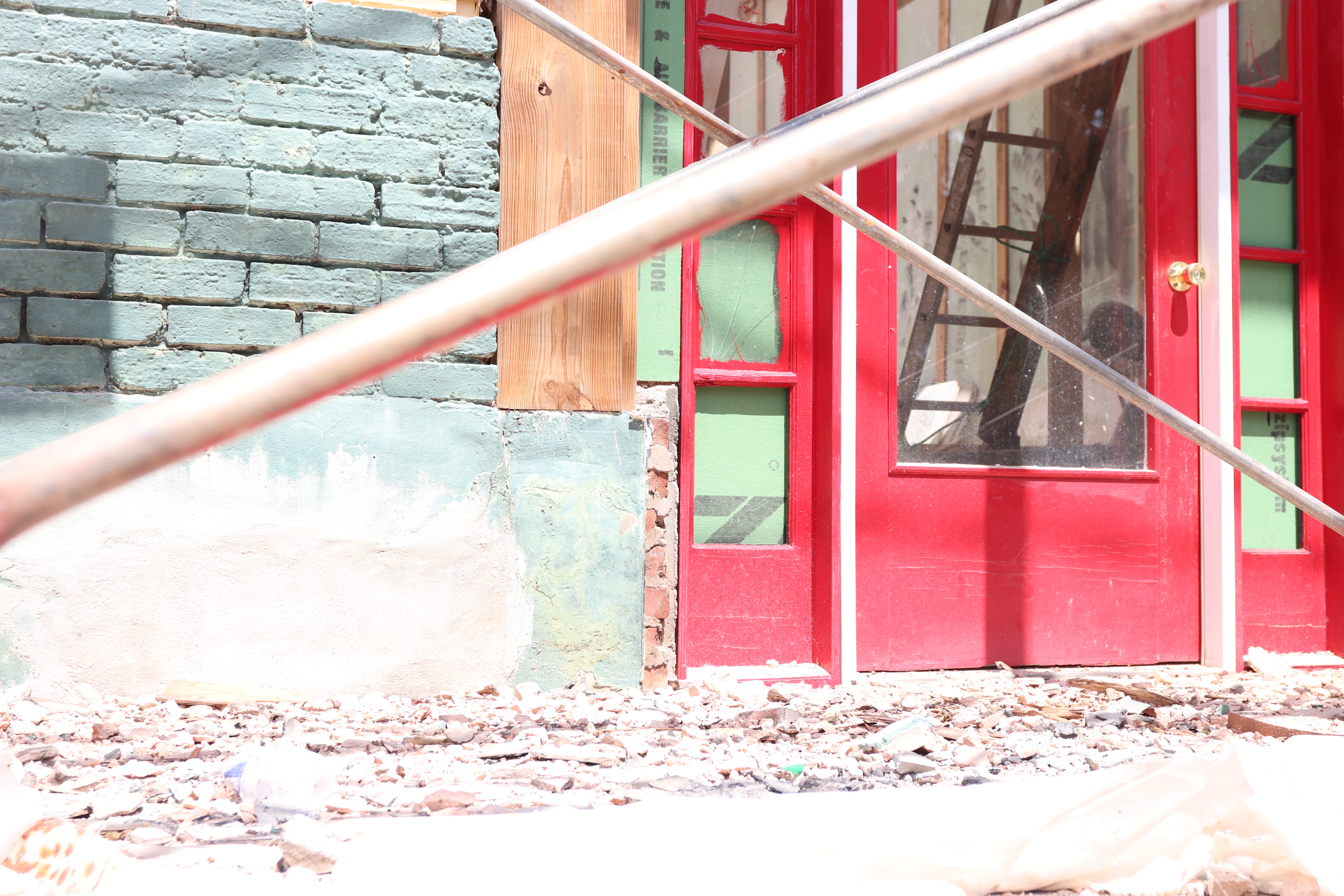 Rubble sits outside of 112 W. Main Street on Sept. 3, 2025 in Lexington, Georgia. The downtown commercial core is a part of Lexington's Downtown Master Plan aimed at revitalizing the city. (Photo/Mia Fishman)