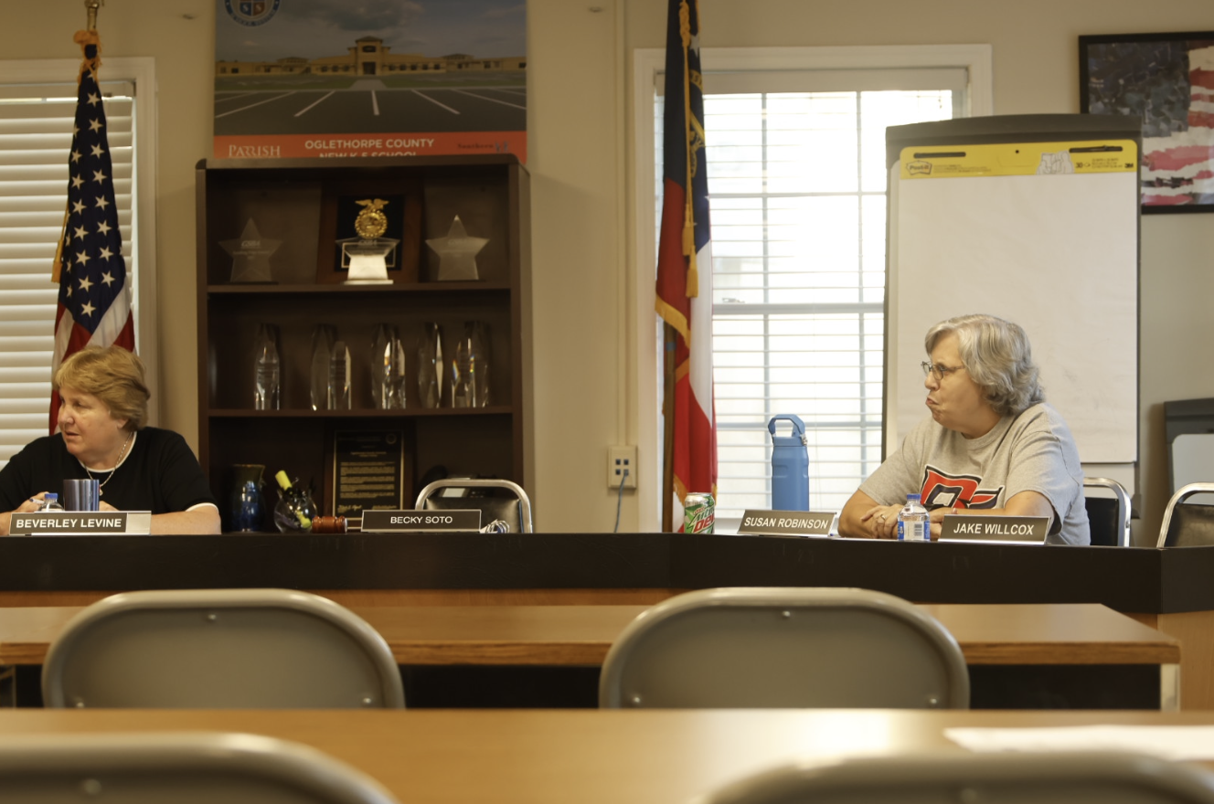 Oglethorpe County Board of Education members Beverley Levine, left, and Susan Robinson prepare for the board meeting on Tuesday, Sept. 2. The two discussed upcoming agenda items as they prepared for the meeting to begin. (Photo/Ella Jones)