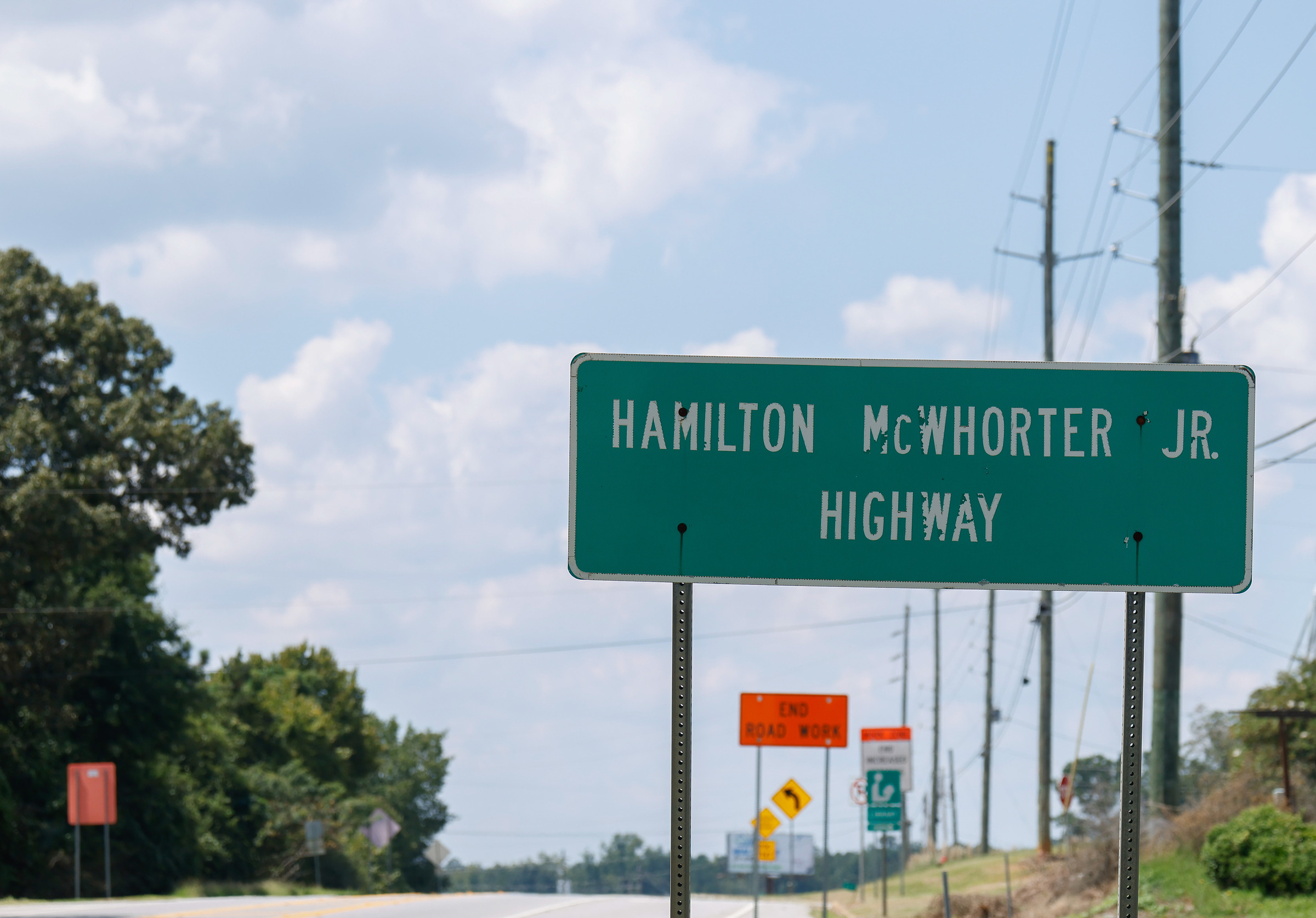 A sign marks the section of road named for Hamilton McWhorter Jr. on Highway 78 heading northwest from Lexington on Aug. 28, 2025. The Oglethorpe County native is remembered for his contributions to Lexington and the county. (Photo/Susanna Johnson)