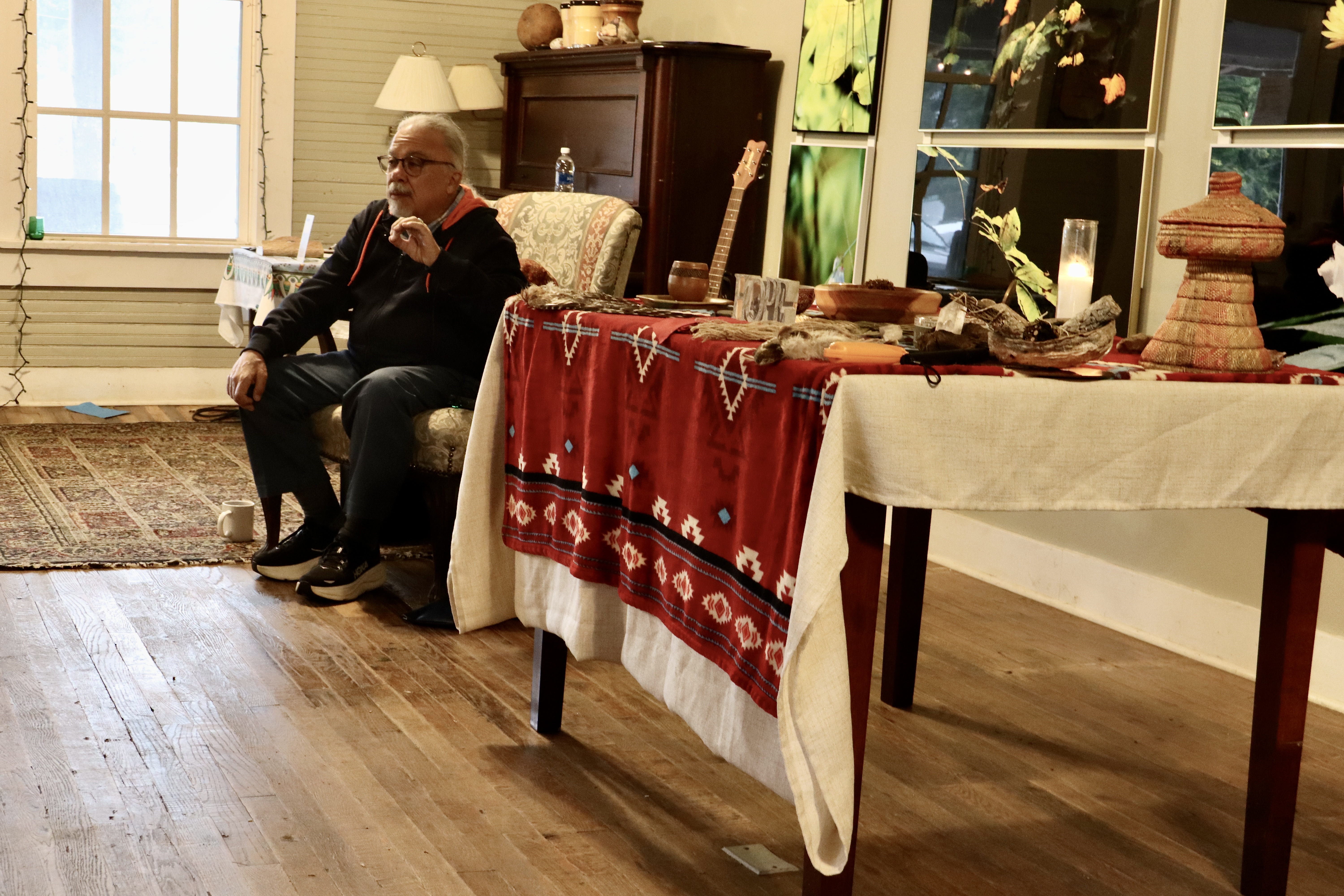 Robert “Black Eagle” Costa addresses his congregation during a recent Seventh Generation Native American Church service at No. 3 Railroad St. This Sunday spiritual centered on leaves as a symbol of hope. (Photo/Molly Moore)