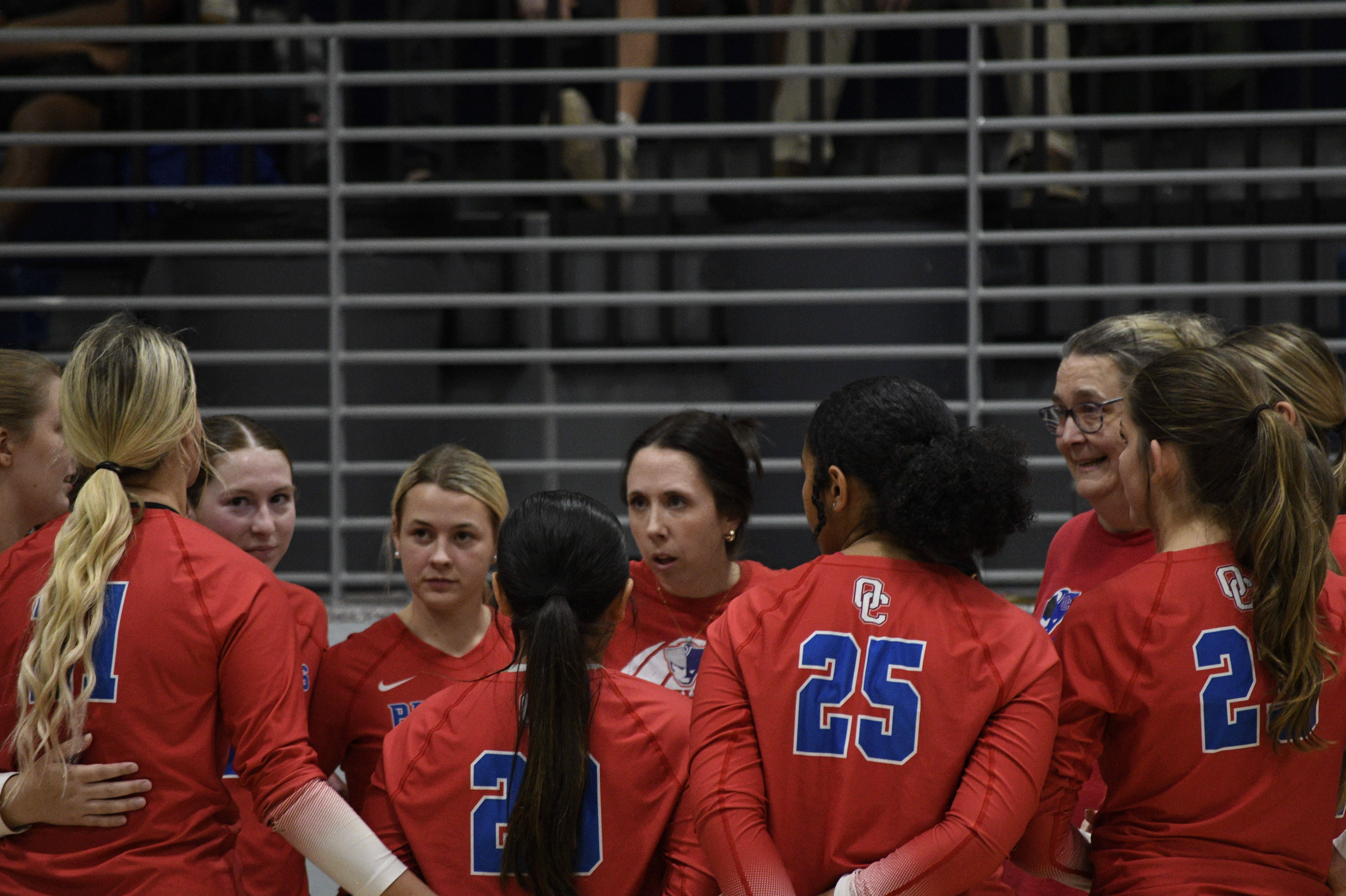 Oglethorpe County coach Brianne Harrison huddles with her team during a Class A volleyball tournament victory over Lake Oconee Academy on Oct. 22 The Patriots advanced to the state championship match. (Andy Mathis/The Oglethorpe Echo)