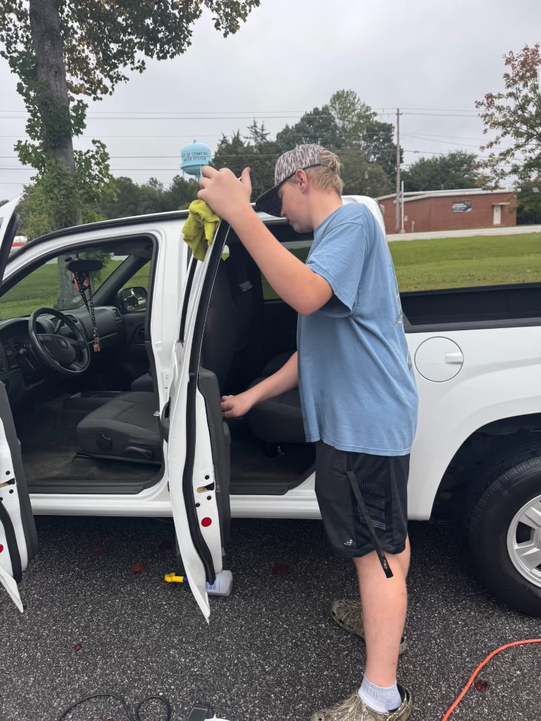 Landon Howard, owner and founder of Howard’s Detailing, has been detailing cars since early 2023. A junior at OCHS, Howard balances academics, club and leadership involvement, church involvement and running his business. (Submitted Photo)