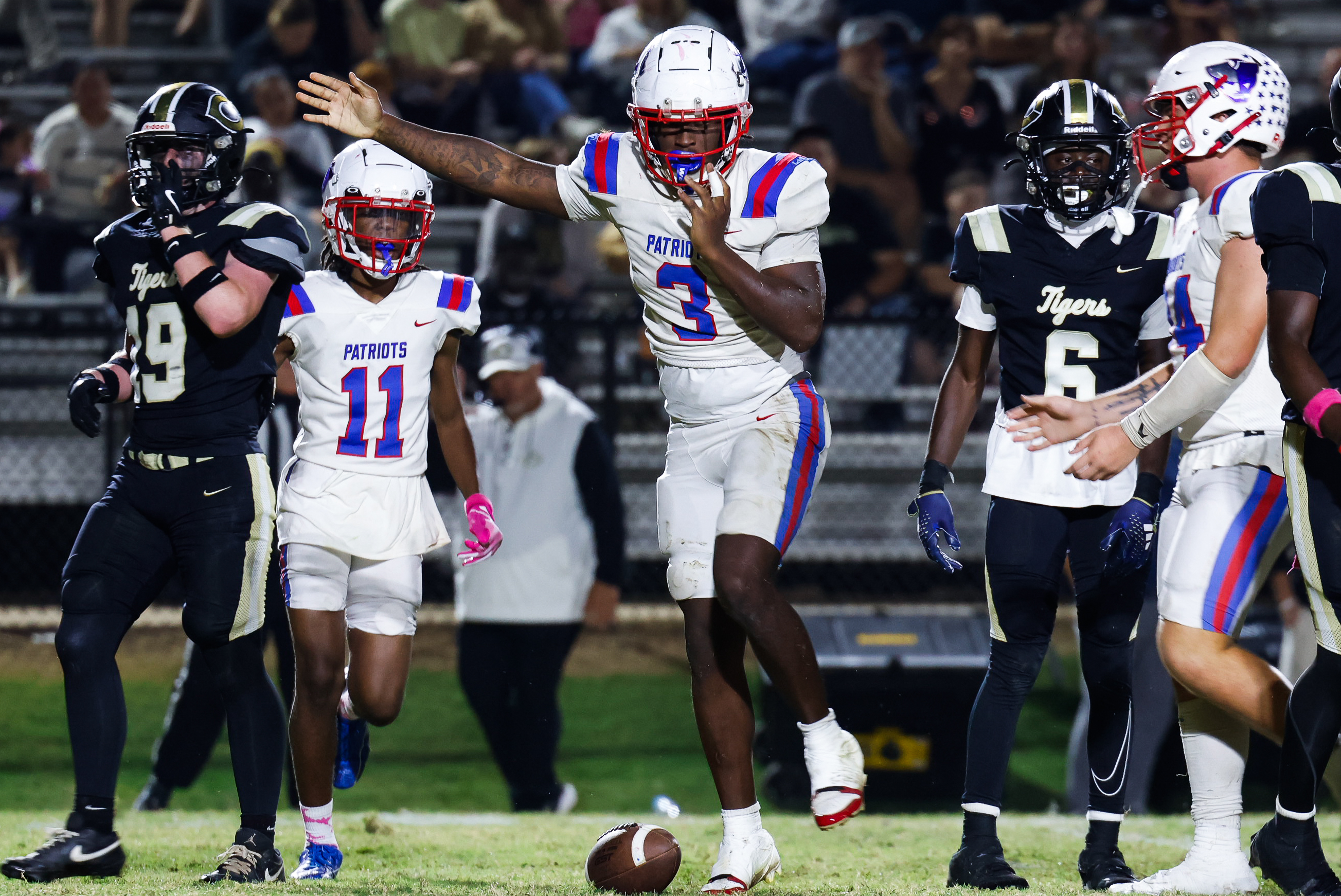 (DREW BEARDEN/THE OGLETHORPE ECHO) Oglethorpe County senior running back O'Maury Huggs signals for a first down in the Patriots’ 24-14 victory over Commerce on Oct. 17. Huggs has rushed for 344 yards this season.