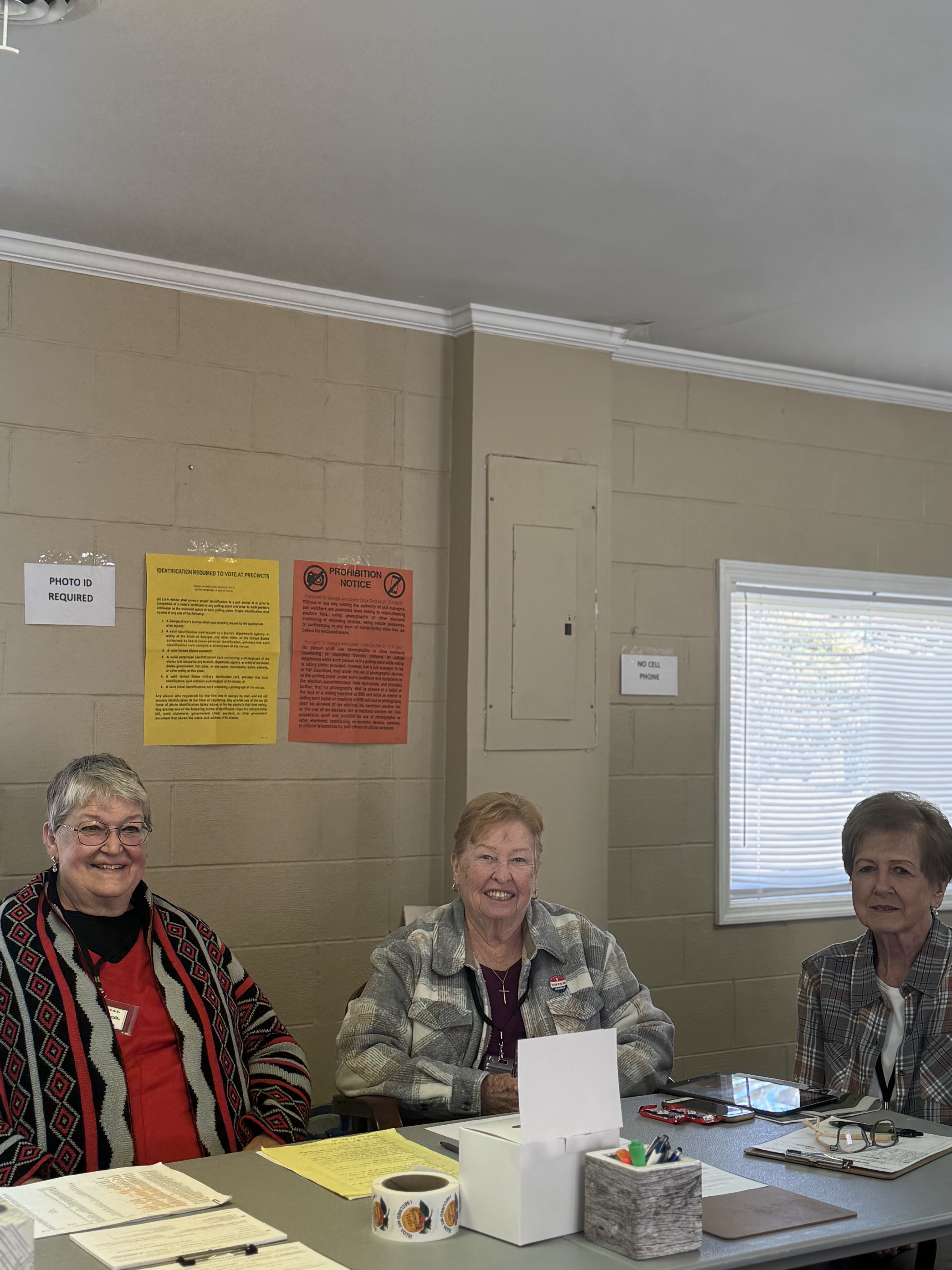 Rebecca Smith (left), Lucille Endriss  (middle) and Gail Spearing (right) volunteer as poll workers for the Lexington mayoral race between Cory Crayton and Evelyn Reece. There are 176 voters who are eligible to vote in this election. (Mia Fishman/The Oglethorpe Echo)