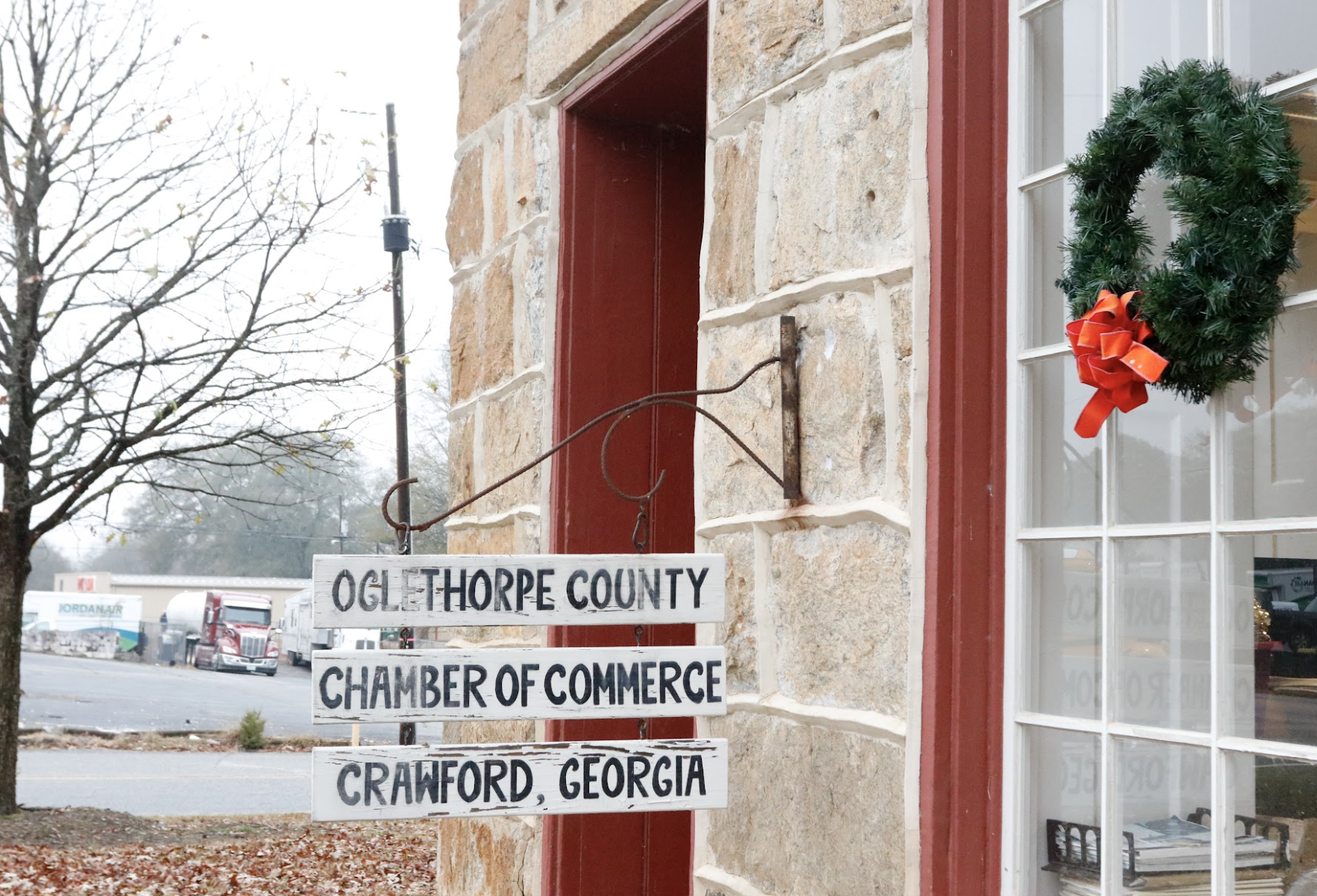 The Oglethorpe County Chamber of Commerce sign hangs from the Crawford Depot. New “Patriot Bucks” program aims to boost small businesses by rewarding residents for shopping local. (Photo/Ansley Gavlak)