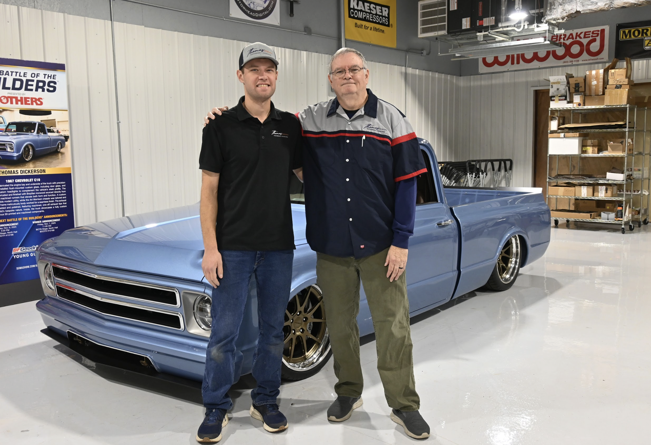 Thomas Dickerson (left) and his dad, Joe Ed Dickerson, pose in front of the 1967 Chevrolet C-10 at the Thomas Performance Engineering shop in Lexington last week. Thomas plans to open the shop in early 2026. (Photo/Neva Drane)