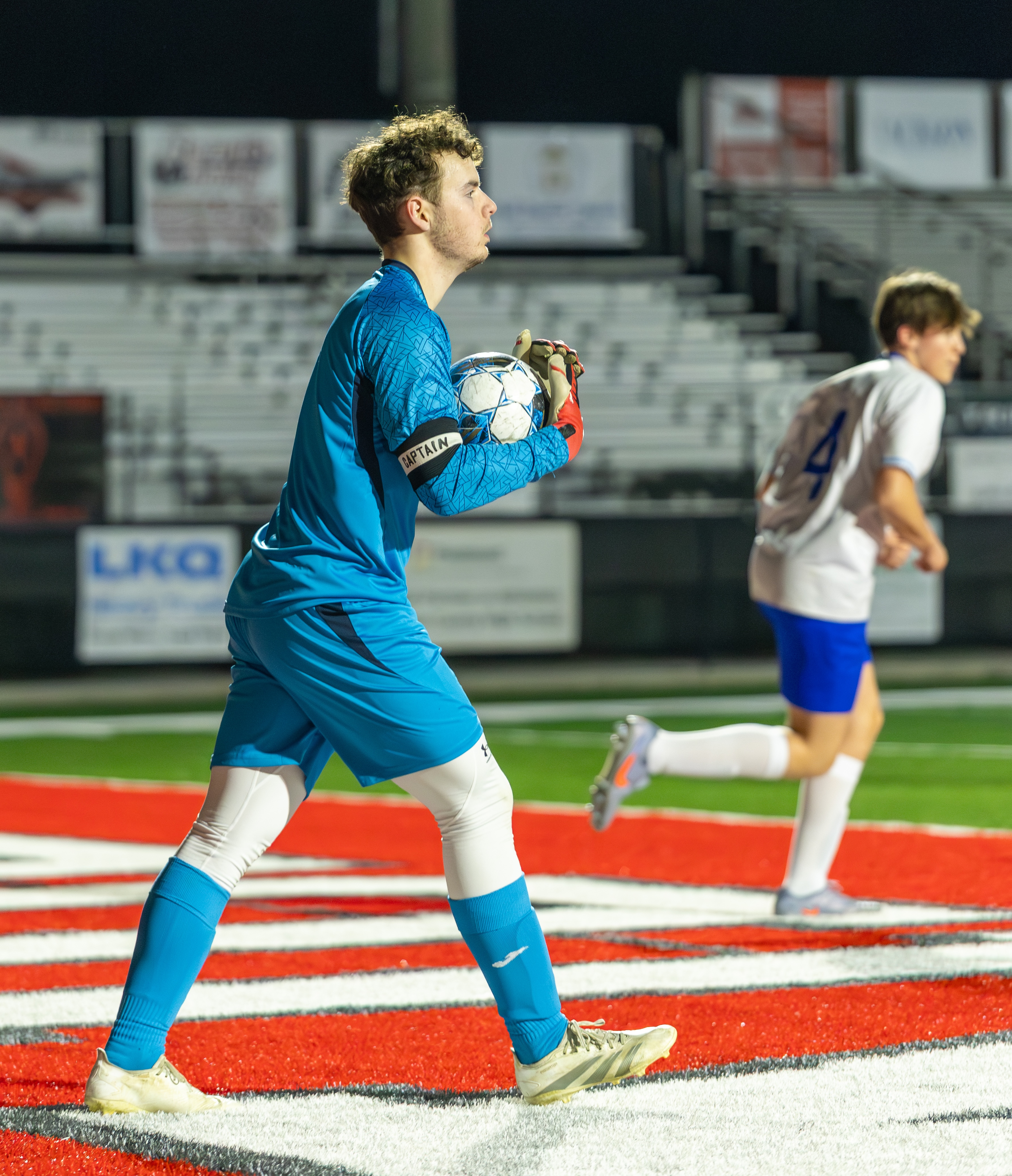 TY JOHNSTON/THE OGLETHORPE ECHO Oglethorpe County keeper Braxton Edmondson looks upfield for a teammate during a game against Madison County on Feb. 13. Edmonson also kicked and punted for the football team.