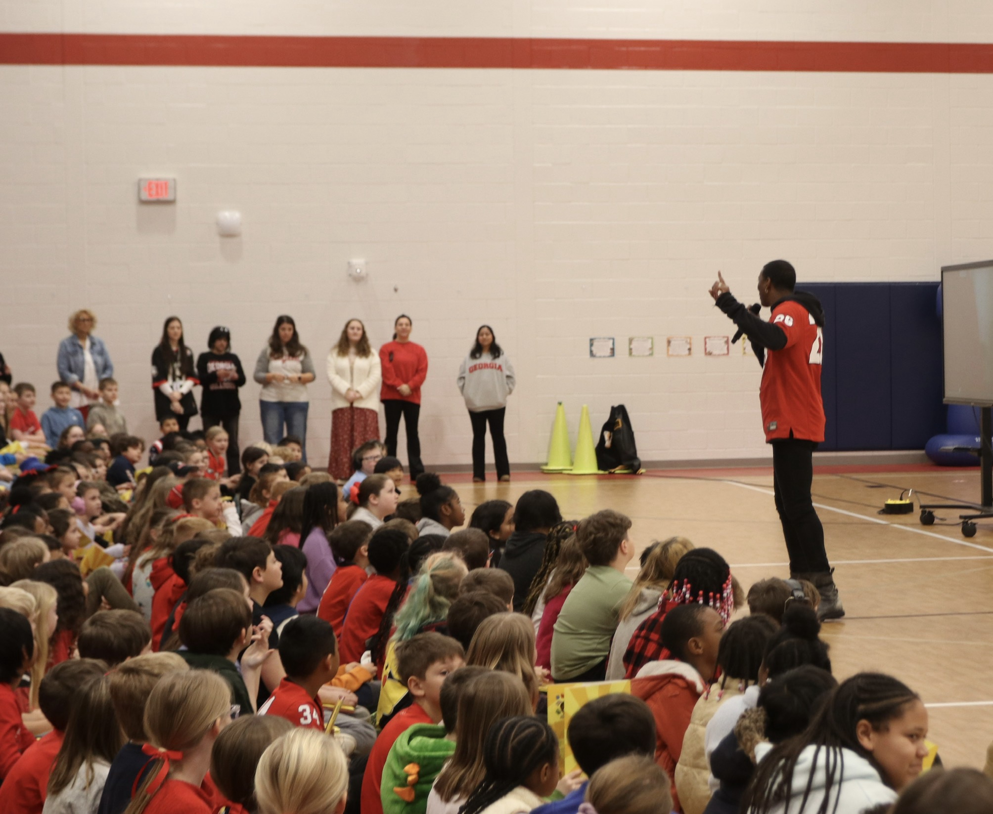 Malcolm Mitchell, author and former NFL athlete, teaches students about the power of reading at OCES, on Feb. 4, 2026. “I learned that reading was like magic,” Mitchell said. (CHARLOTTE COCHRAN/THE OGLETHORPE ECHO) 