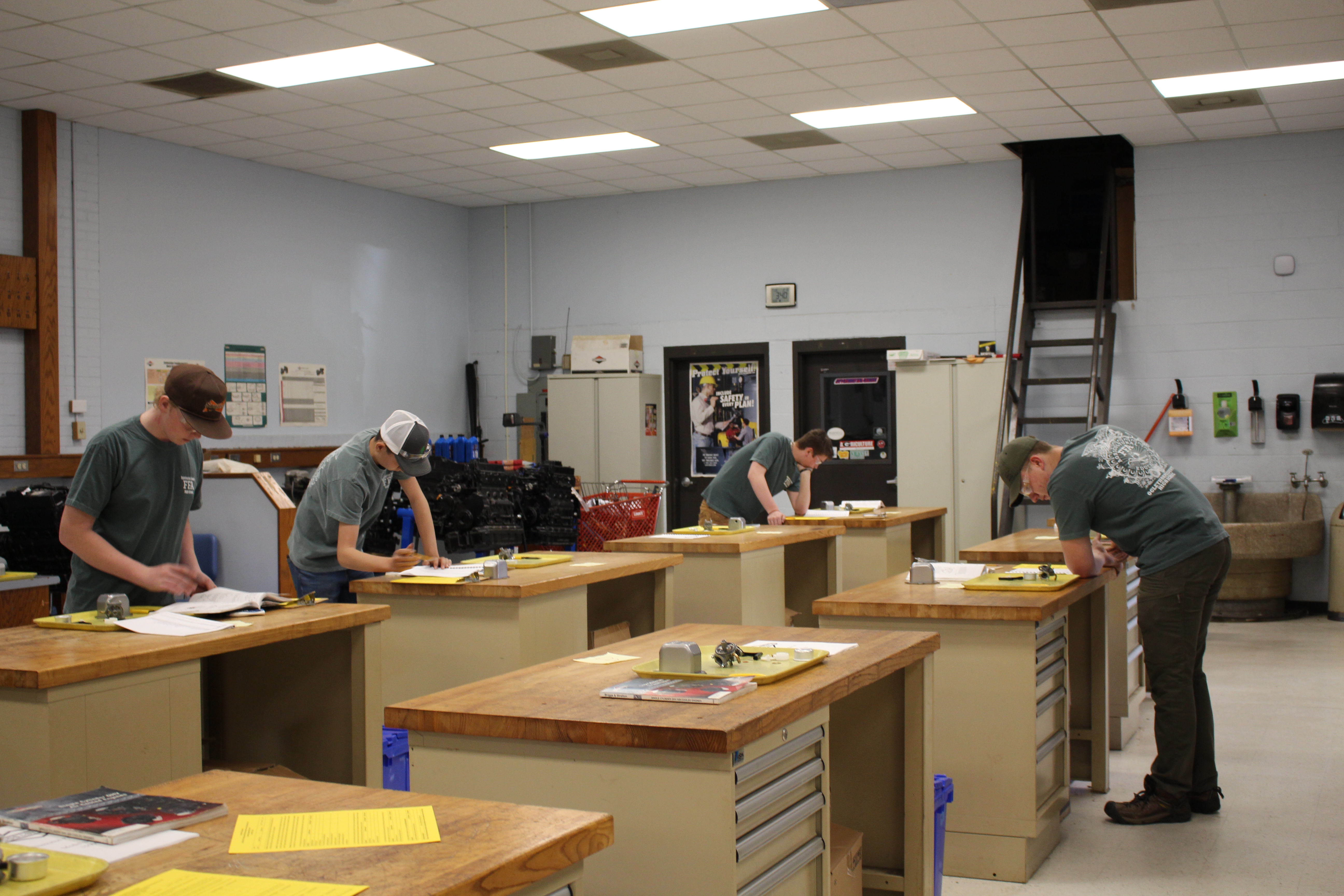 Landon Howard (from left) Cole Faust, Caden Berggren and Ledger Coley compete in the agriculture mechanics event at the FFA Area 2 CDEs on Feb. 10. They finished in second and advanced to the state competition on March 20. (DAKOTA MEEKS/THE OGLETHORPE ECHO)