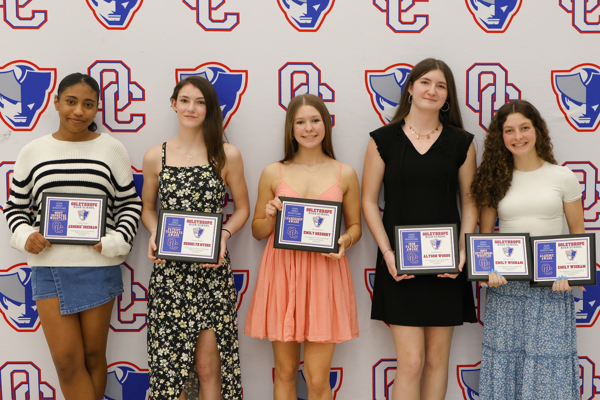 The OCHS girls wrestling award winners (from left): Armonie’ Gresham (Most Improved Wrestler), Brooklyn Myers (Patriot Teammate Award), Emily Gregory (Leadership Award), Alyson Woods (Iron Patriot Award) and Emily Wisham (Most Outstanding Wrestler and Academic Award). (Addison Simmons/The Oglethorpe Echo)