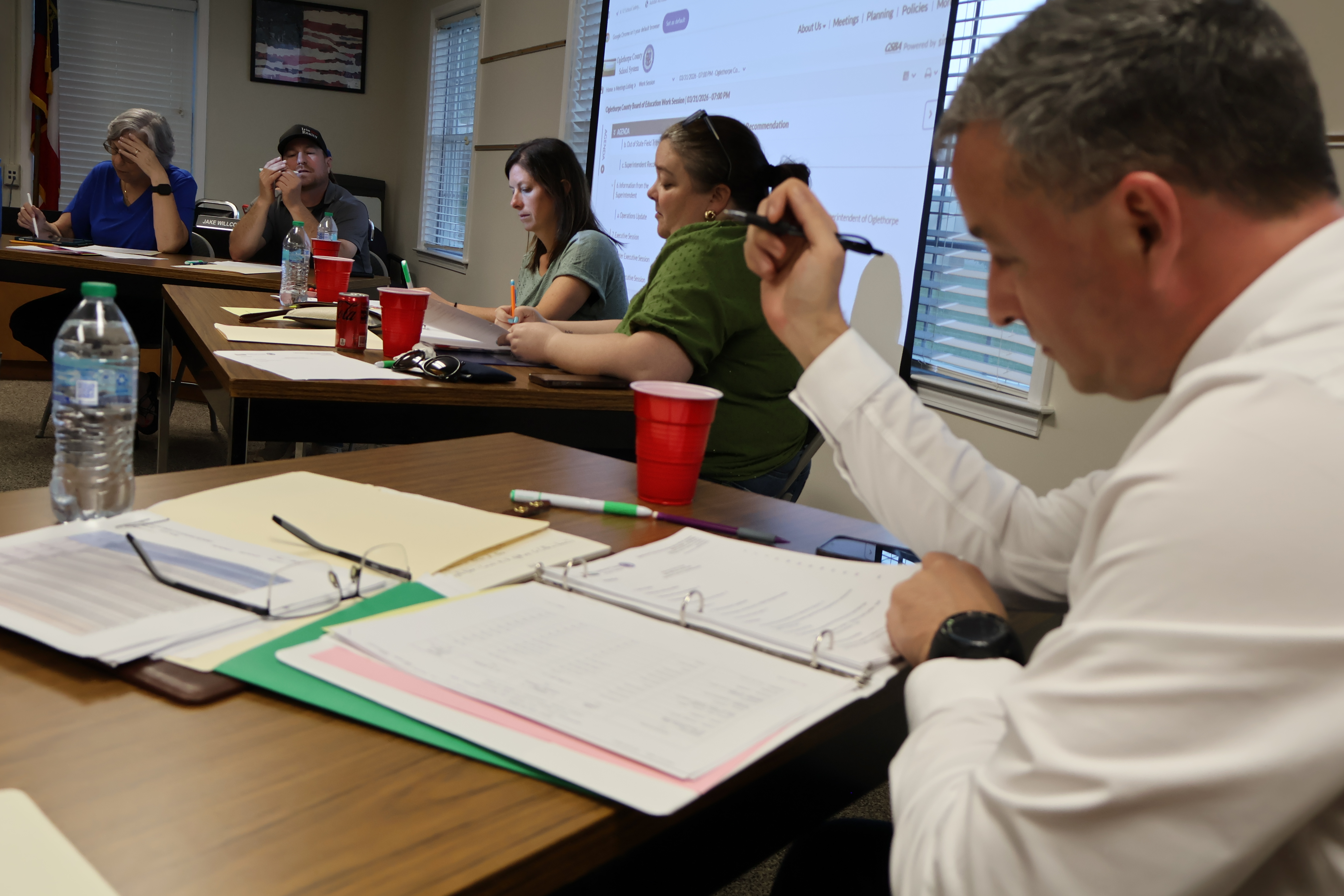 Phillip Powell reads over the agenda for the BOE work session on March 31, 2026. Powell will replace Beverley Levine as superintendent on July 1, 2026. (Photo/Jasmine Milbourne)