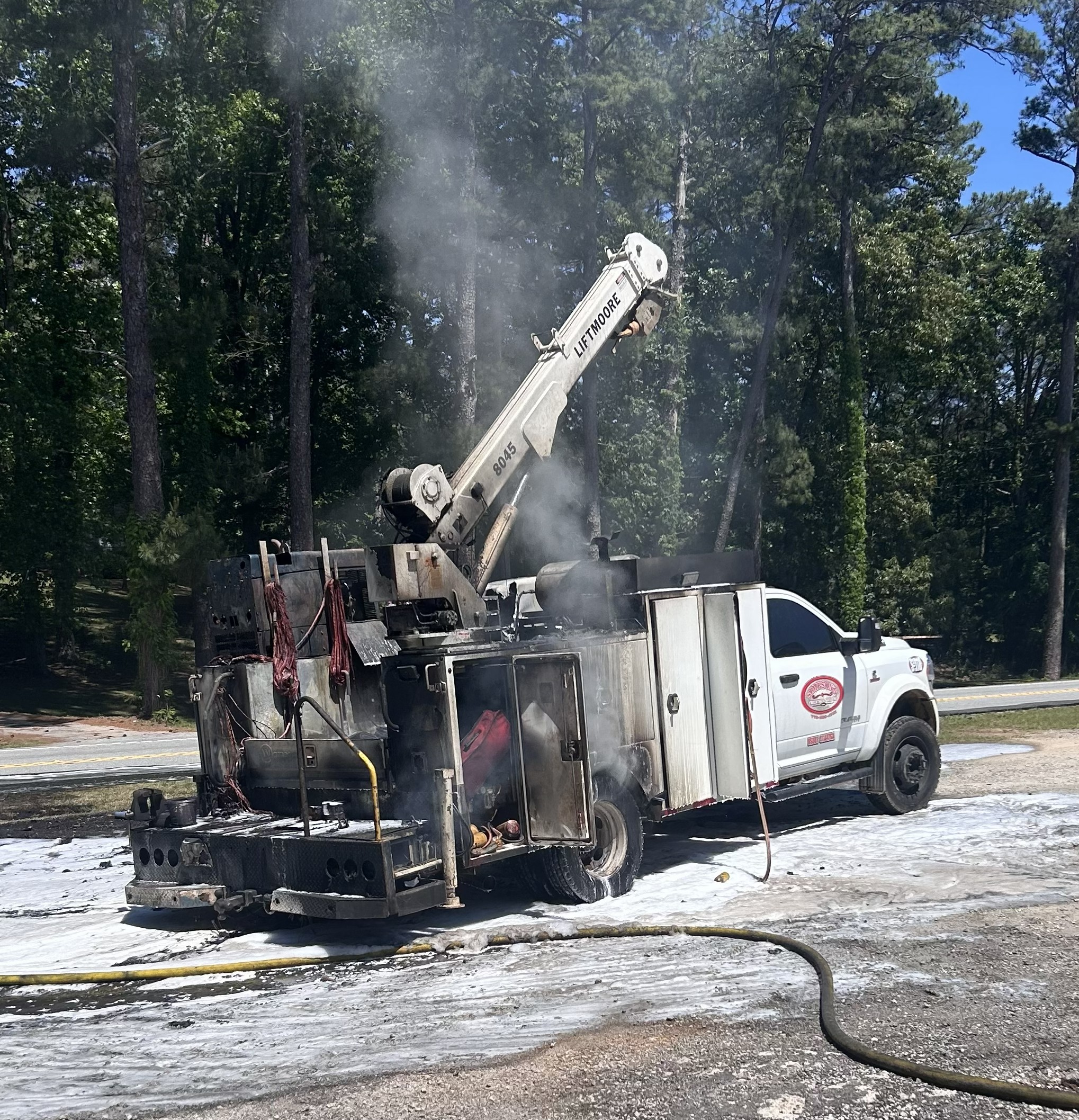 Firefighters from Salem Fire & Rescue extinguish a fire that engulfed a truck at the intersection of U.S. Highway 78 and Crawfordville Road on Monday. Both roads were temporarily shut down while the fire was put out. (Submitted Photo)