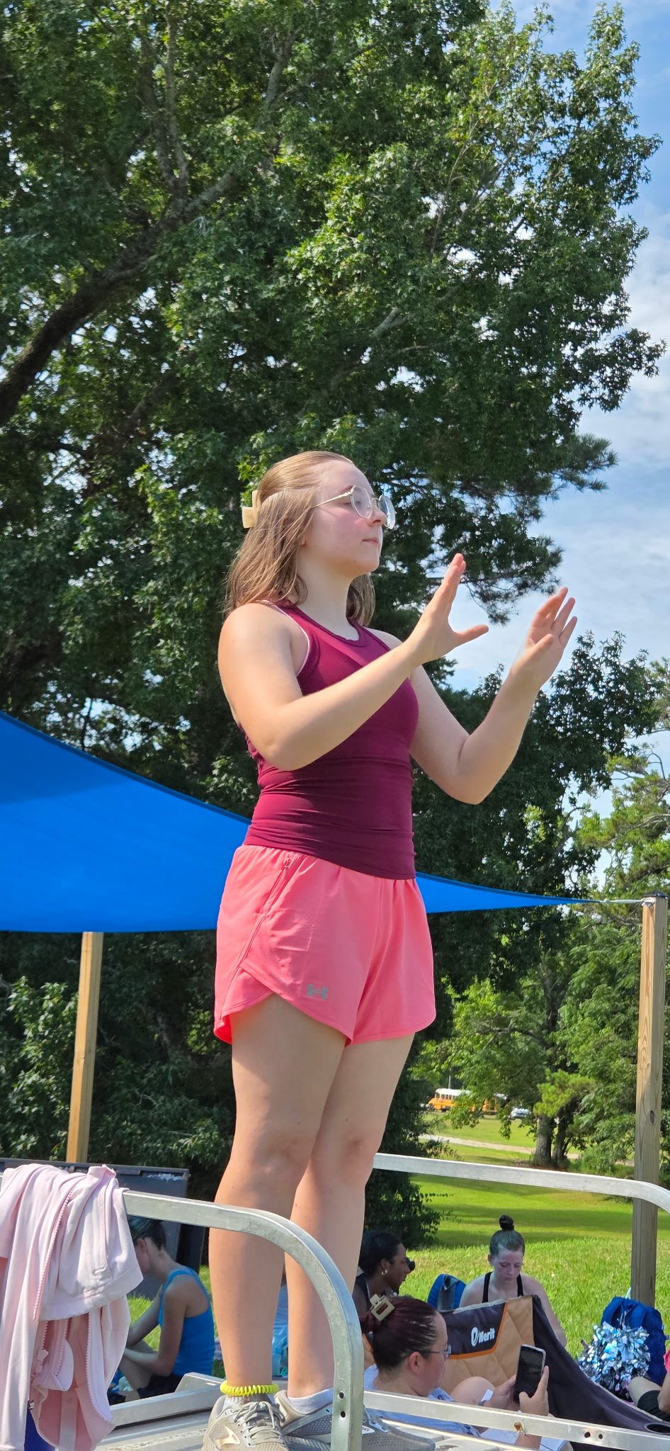 Junior drum major Kassie Mathews directs the OCHS marching band during a recent practice. She is back as drum major for the second consecutive year. (Submitted Photo)