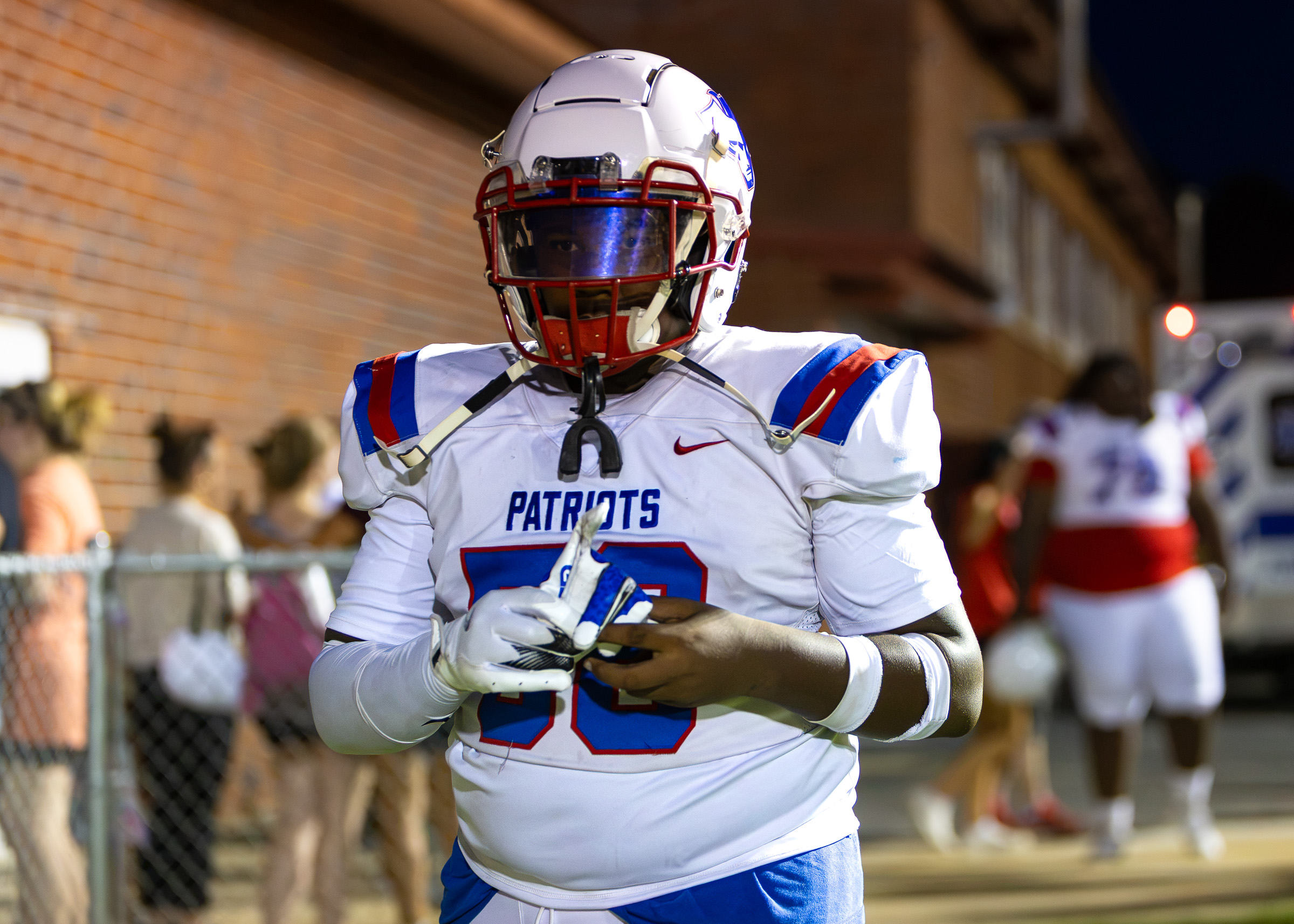 Defensive lineman Zayveon Stribling walks onto the field before a preseason scrimmage at Glascock County on Friday. He’s projected to play both defensive and offensive line this fall. (Ethan Greene/The Oglethorpe Echo)