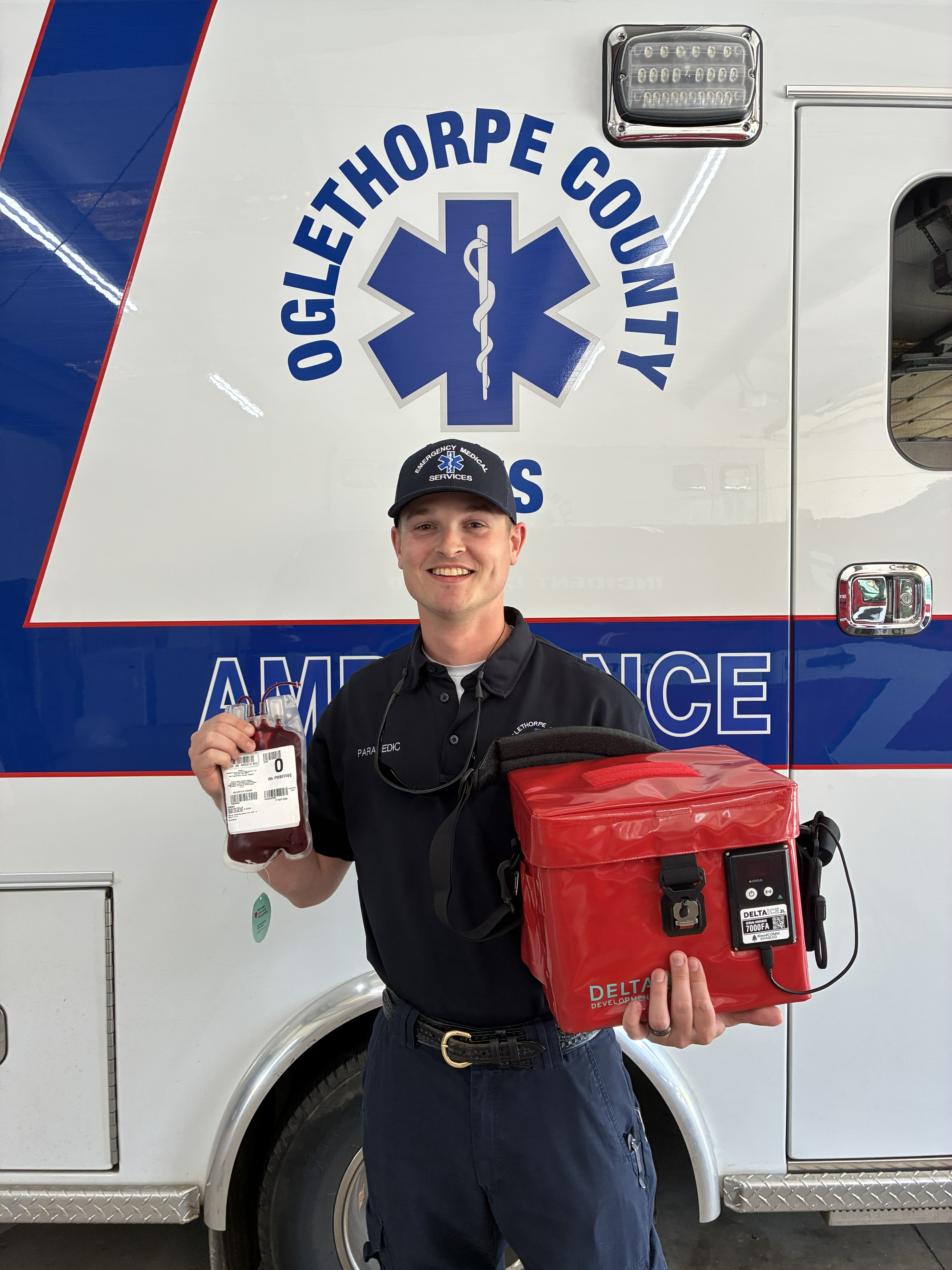 Supervisor paramedic Dylan Smith holds a bag of whole blood product after Oglethorpe County EMS was approved to start the program on Aug. 11. Being able to offer whole blood has been a goal of EMS director Josh Robinson. (Submitted Photo)