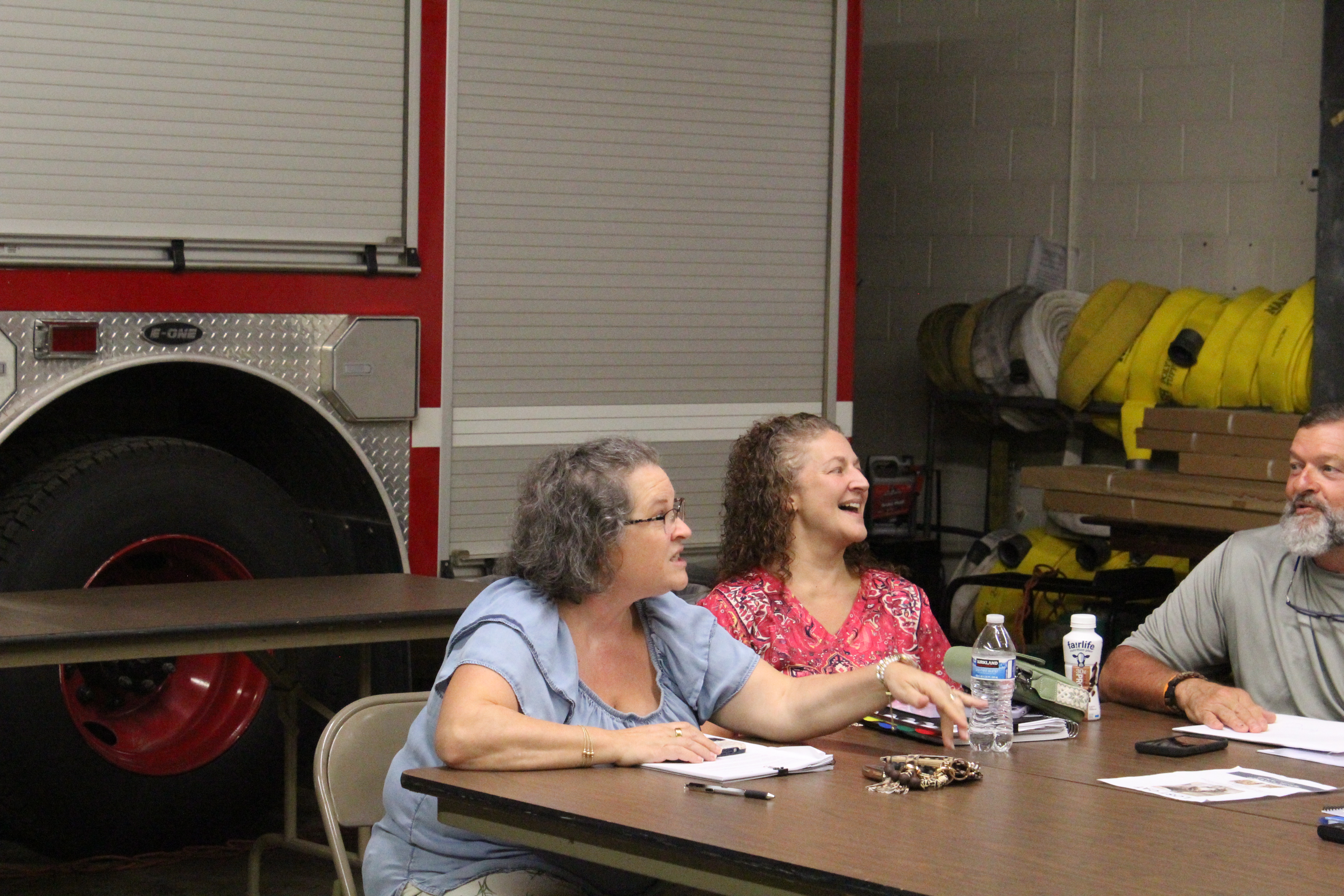 OLIVIA SUITE/THE OGLETHORPE ECHO Carrie Hayes (left) and Carrie Hyatt sit together at Maxeys monthly city council meeting on Sept. 8.  