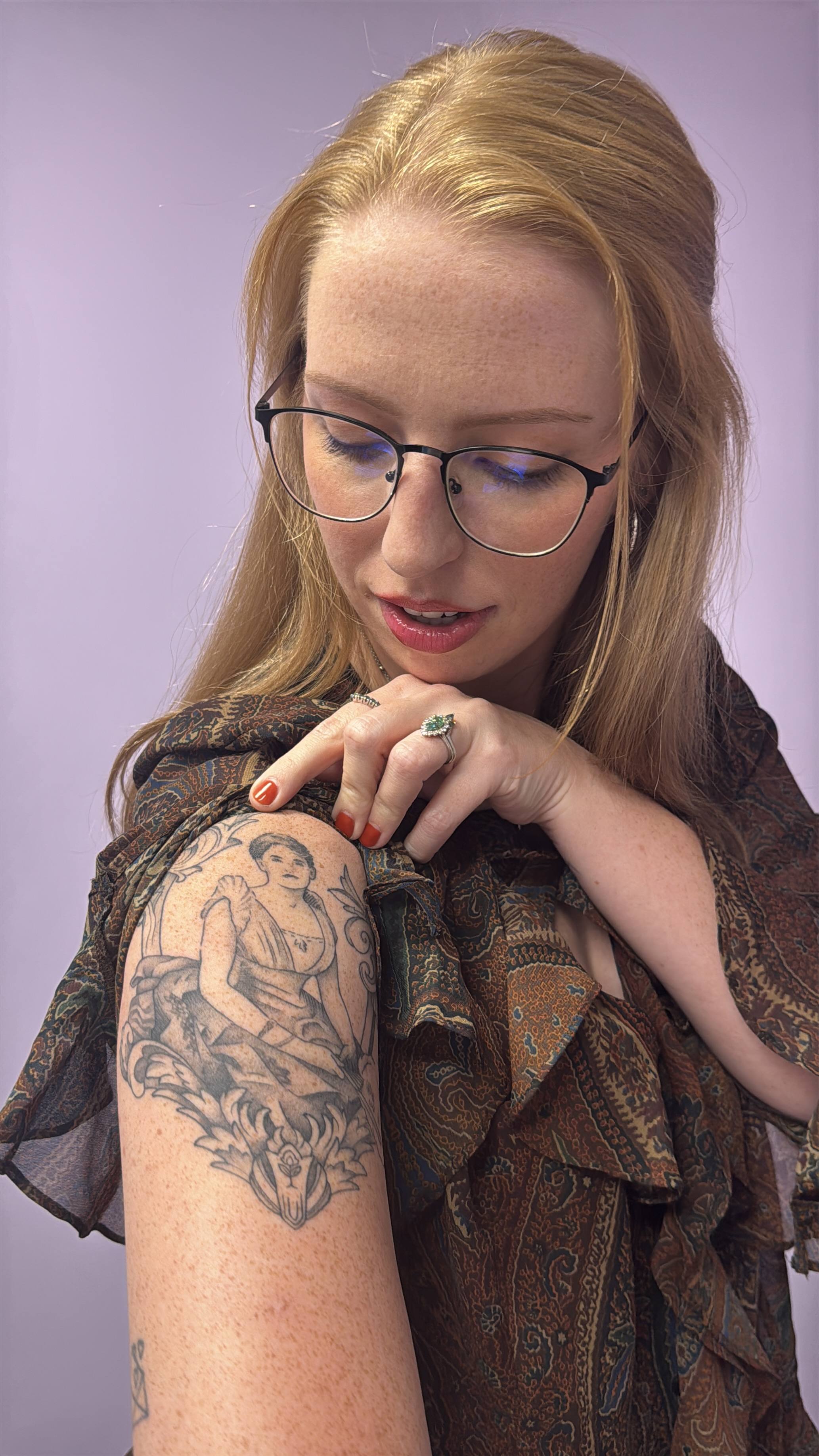 Ansley Land shows off her tattoo of Juliette Gordon Low on Oct. 8, 2026. Low founded Girl Scouts in Savannah, GA in 1912. (Sabrina Felix/The Oglethorpe Echo)
