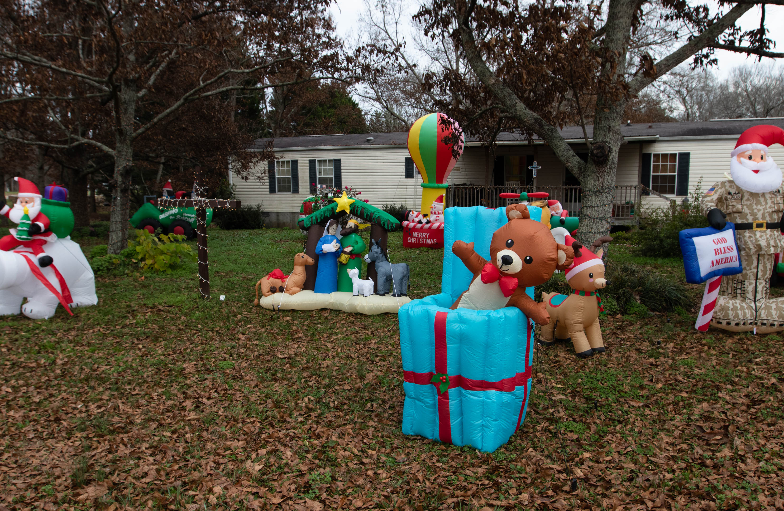 “Christmas on North Street” is the title of Wayne Loggans’ collection of 46 inflatables that decorate his Crawford home and property. Loggans said the number of inflatables he owns continues to grow. (Photo/Sarah White)