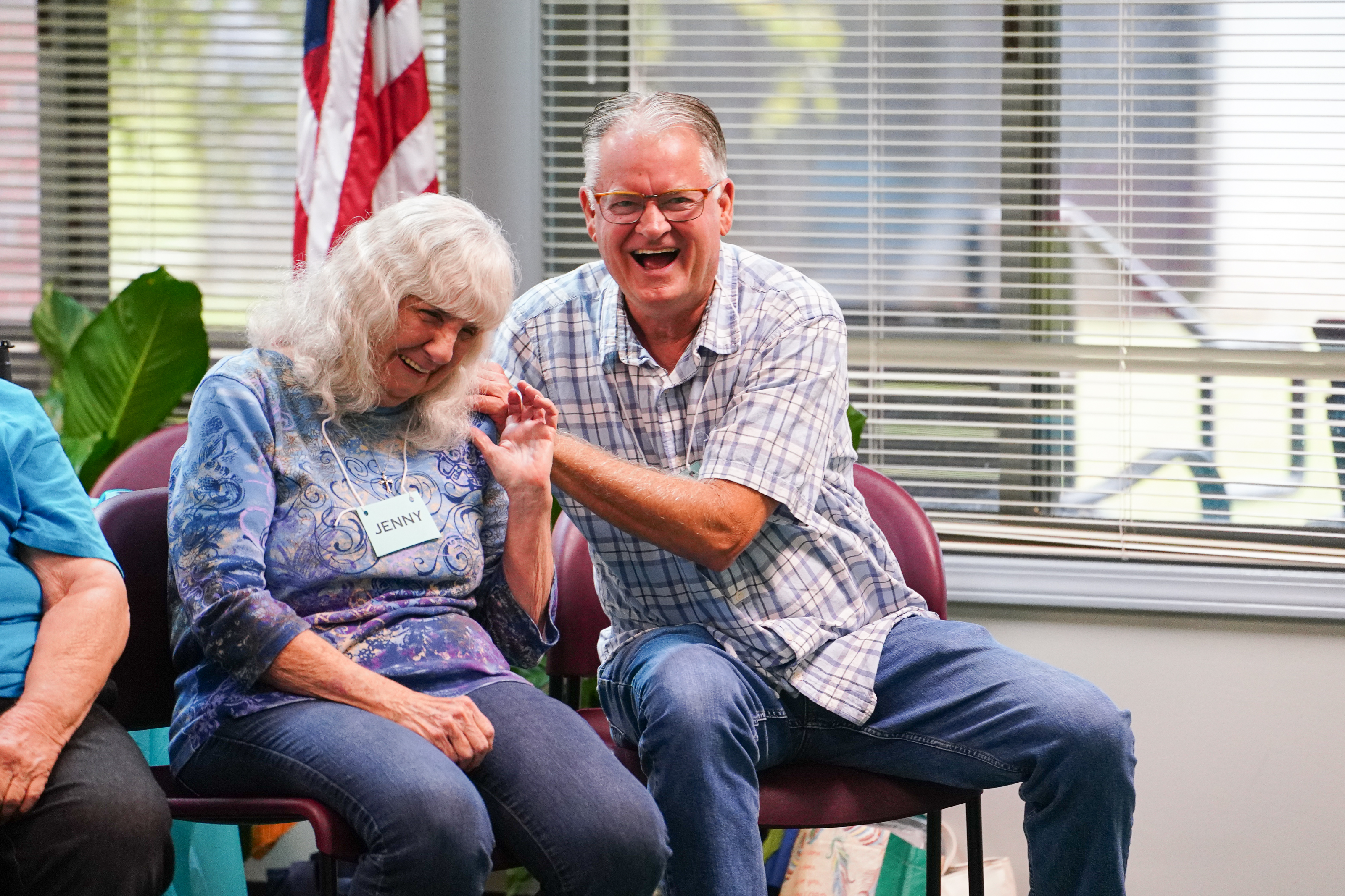Jenny Wynne and Ron Leonard laugh during the round on Friday. NBA All Star Dwight Howard hosted 'Family Feud' at the Oglethorpe Senior Center in Crawford, Georgia. (Sidney Chansamone/The Oglethorpe Echo)