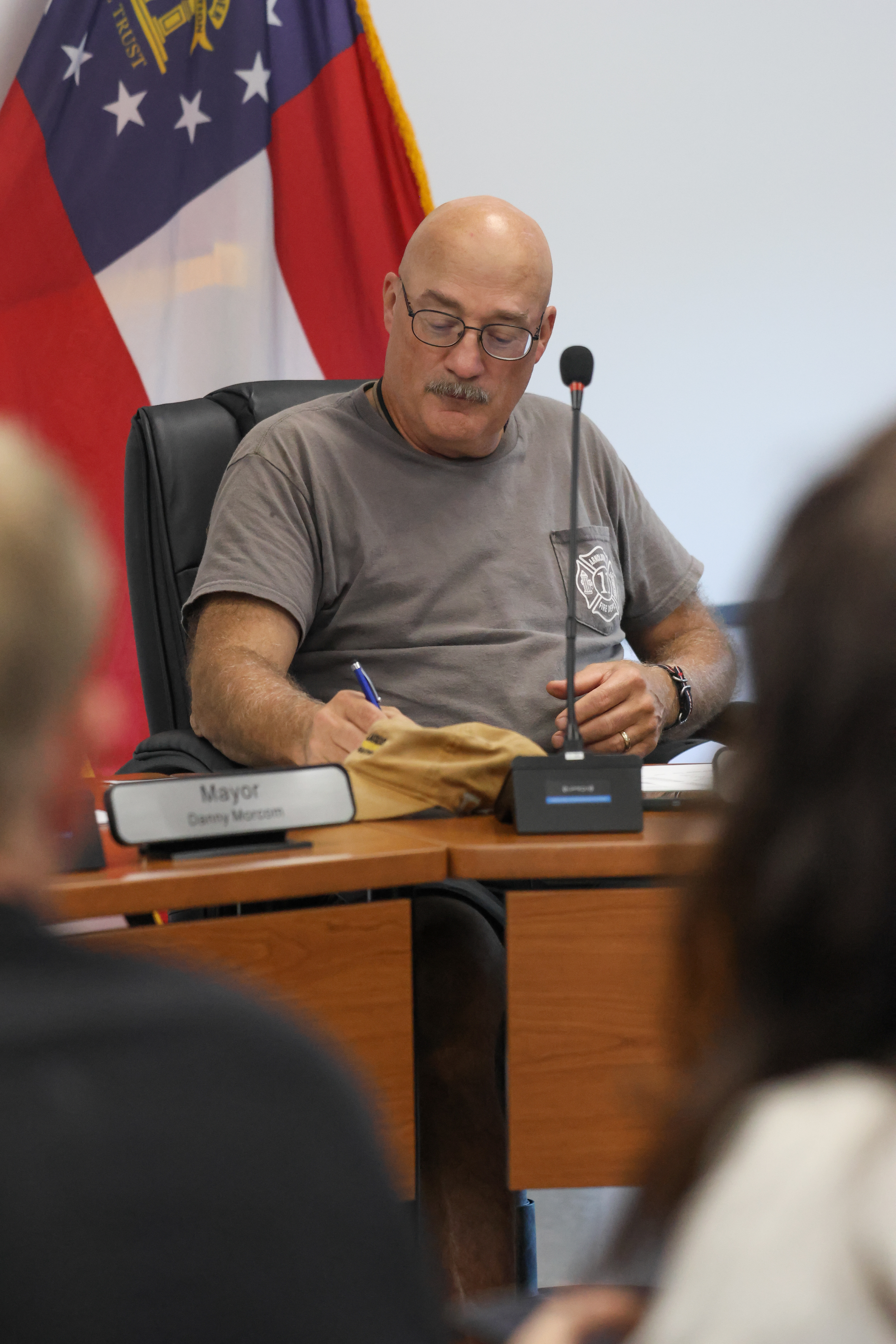 Arnoldsville City Council member Douglas Cosby takes notes during a council meeting on Oct. 15. Cosby abstained from voting to adopt the Oglethorpe County Comprehensive Plan. (Photo/Mollie Beth Johnson)