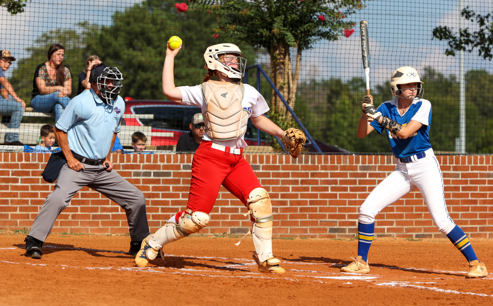 Senior catcher Abby Jones passes to second base to force a runner out in the first inning of Oglethorpe County High School softball's 7-3 loss to Washington-Wilkes Comprehensive High School on Thursday, August 31, 2023, in Lexington, Georgia. The softball team celebrated Jones as its only graduating senior during its Senior Night celebrations prior to its game against Washington-Wilkes. (Photo/Cassidy Hettesheimer)