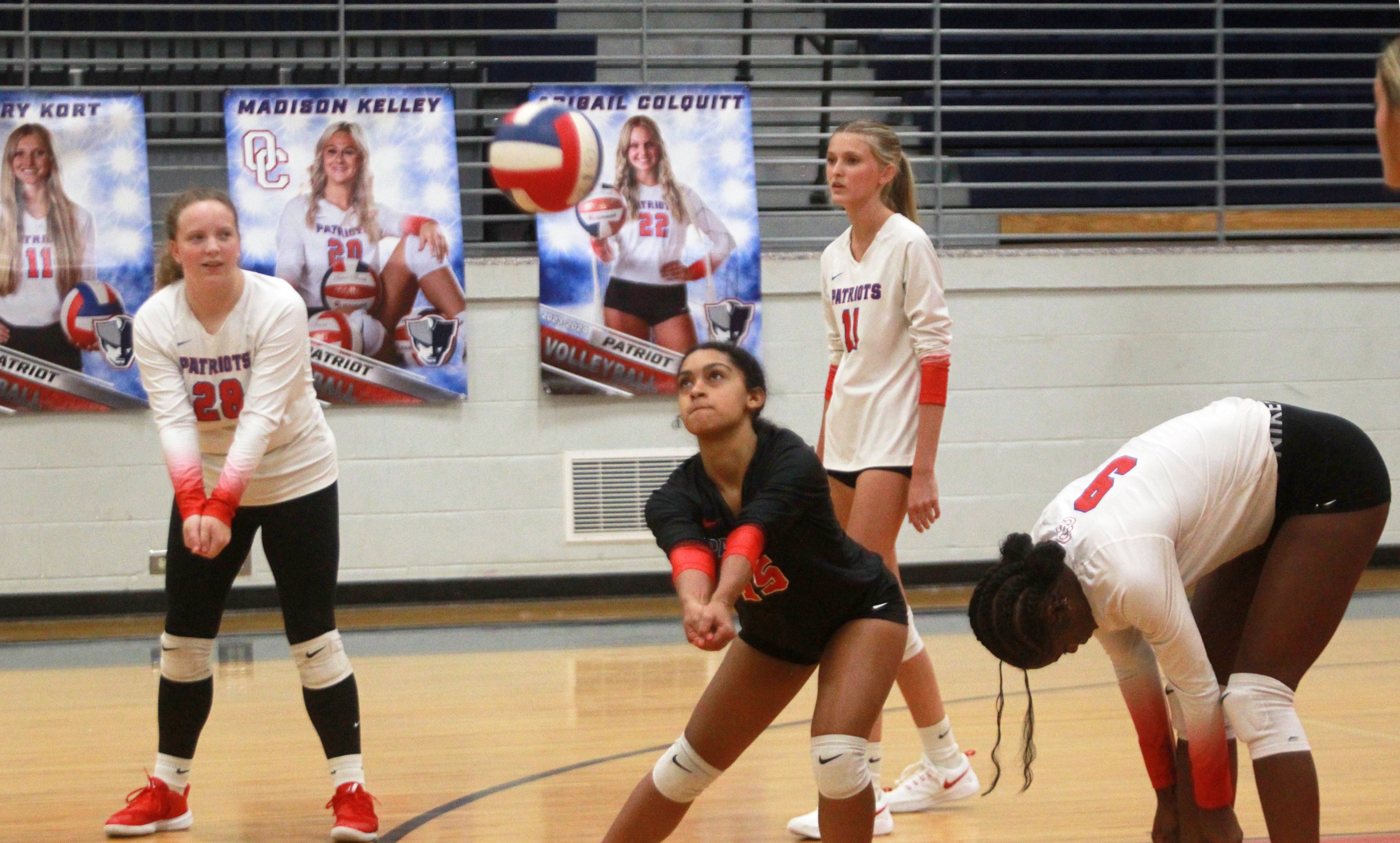 Sophomore libero Aryana Knight warms up with her teammates before Oglethorpe County High School's volleyball match against Greene County in Lexington, Georgia, on Thursday, Sept. 7, 2023. The Lady Patriots defeated the Lady Tigers in straight sets to move to 14-3 on the season and remain undefeated in region play (4-0). (TREVYN GRAY/OGLETHORPE ECHO))