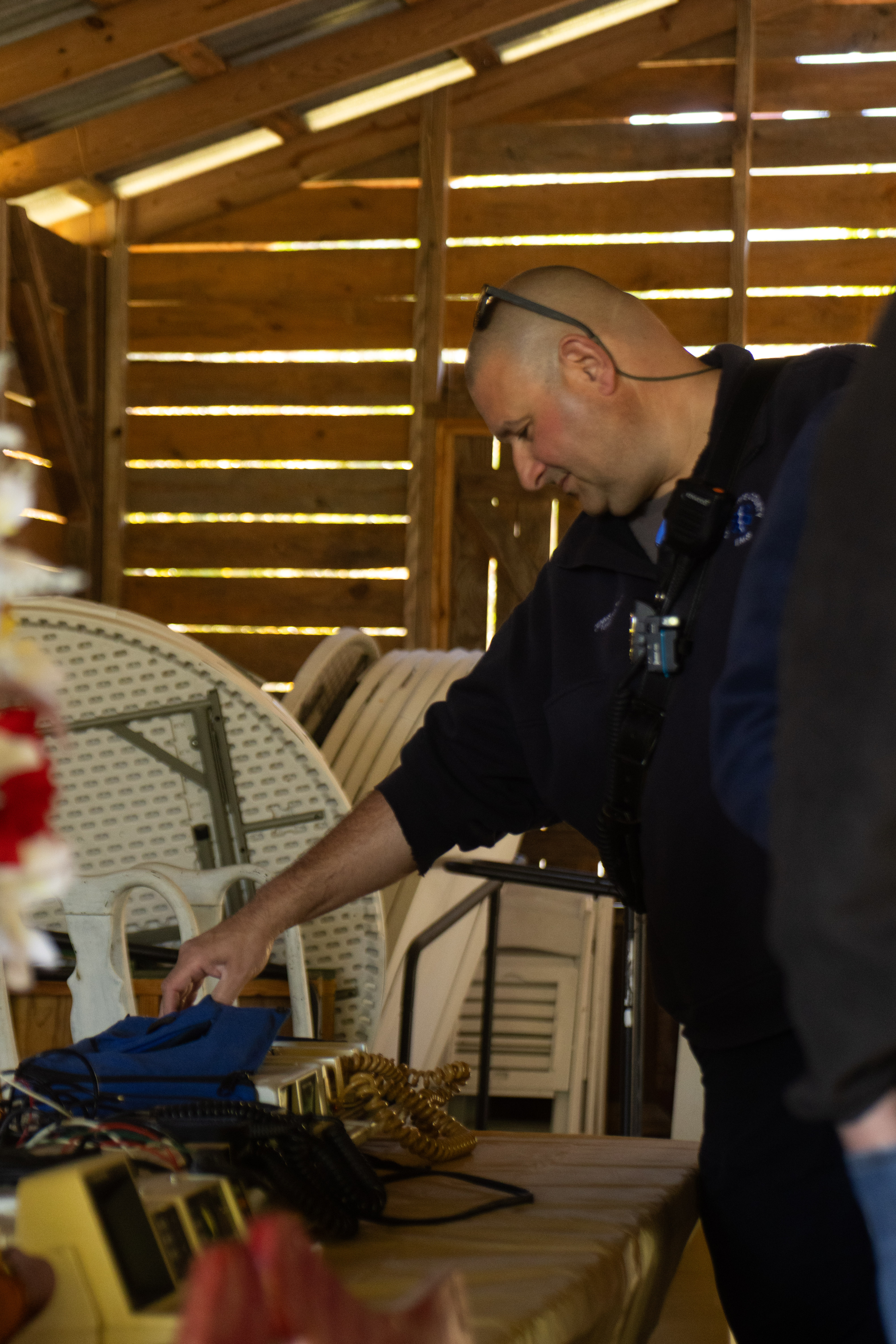 Dennis Weaver looks at the defibrillator equipment from 1988, known as the LIFEPAK 5, at the EMS 50th anniversary celebration on Friday, Oct. 23, 2026. Weaver is a paramedic supervisor at EMS and started as a paramedic in Wilkes county in1994, and started working with Oglethorpe EMS in 2007. (SARAH ROPER/THE OGLETHORPE ECHO)