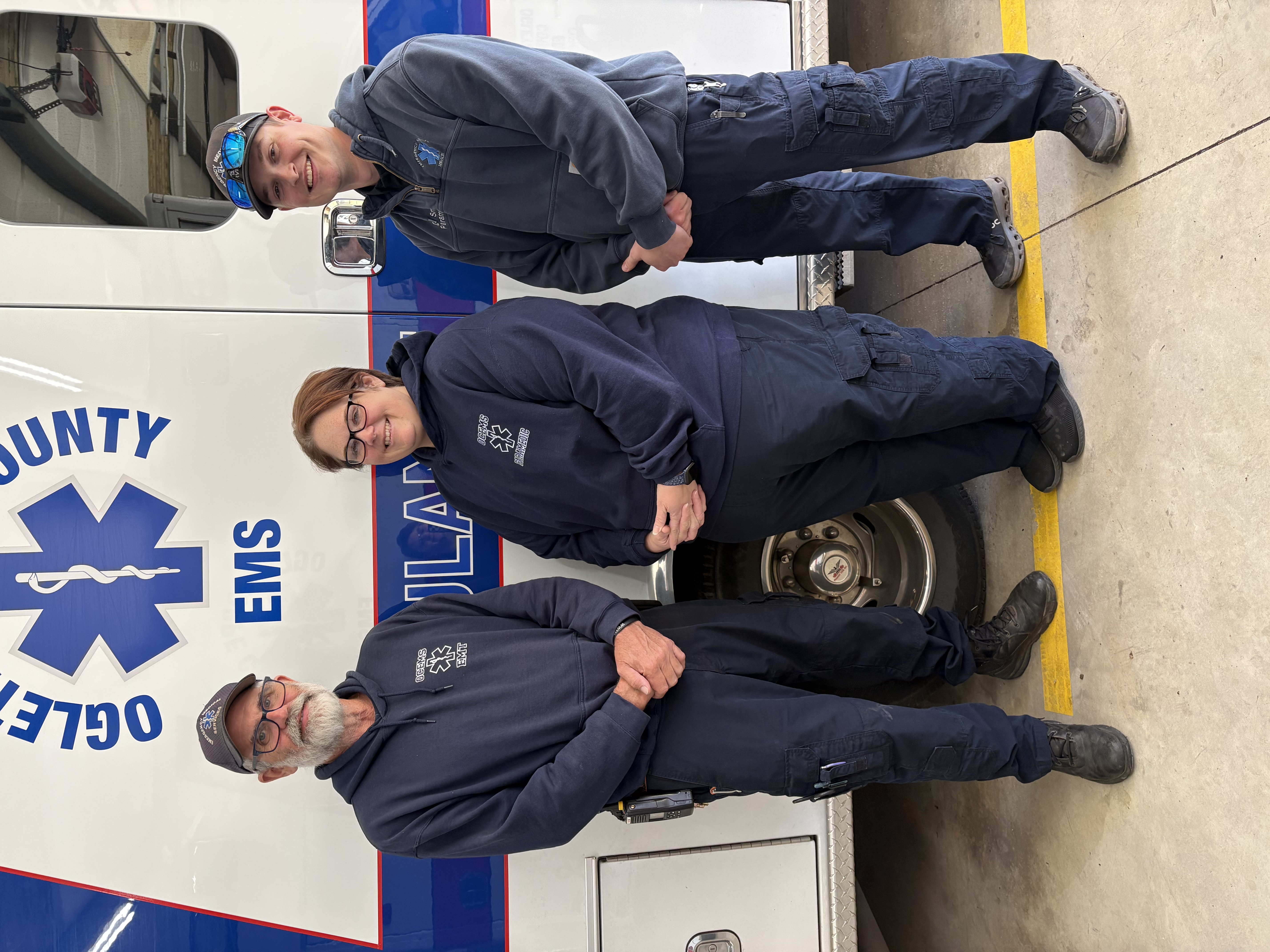 Oglethorpe County EMS paramedic and training officer Kristin Gilliam (center), EMT and deputy coroner Robby McCurley (left) and paramedic and shift supervisor Dylan Smith (right) delivered a baby last month. Gilliam has been working in the EMS field for about 15 years. (Submitted Photo)