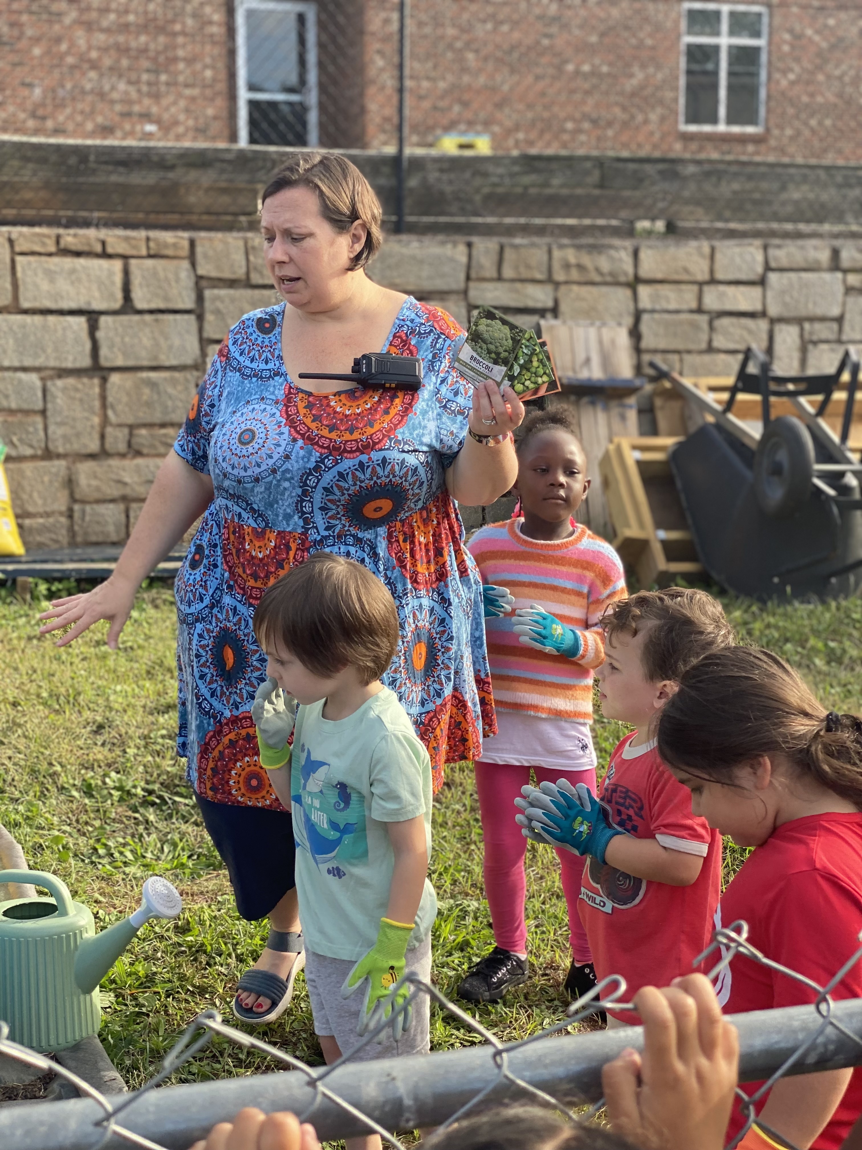 Satilla Mathews teachers her class about planting vegetables in the STEM Garden at Oglethorpe Children's Academy. (Photo Courtesy/Melanee McGee)