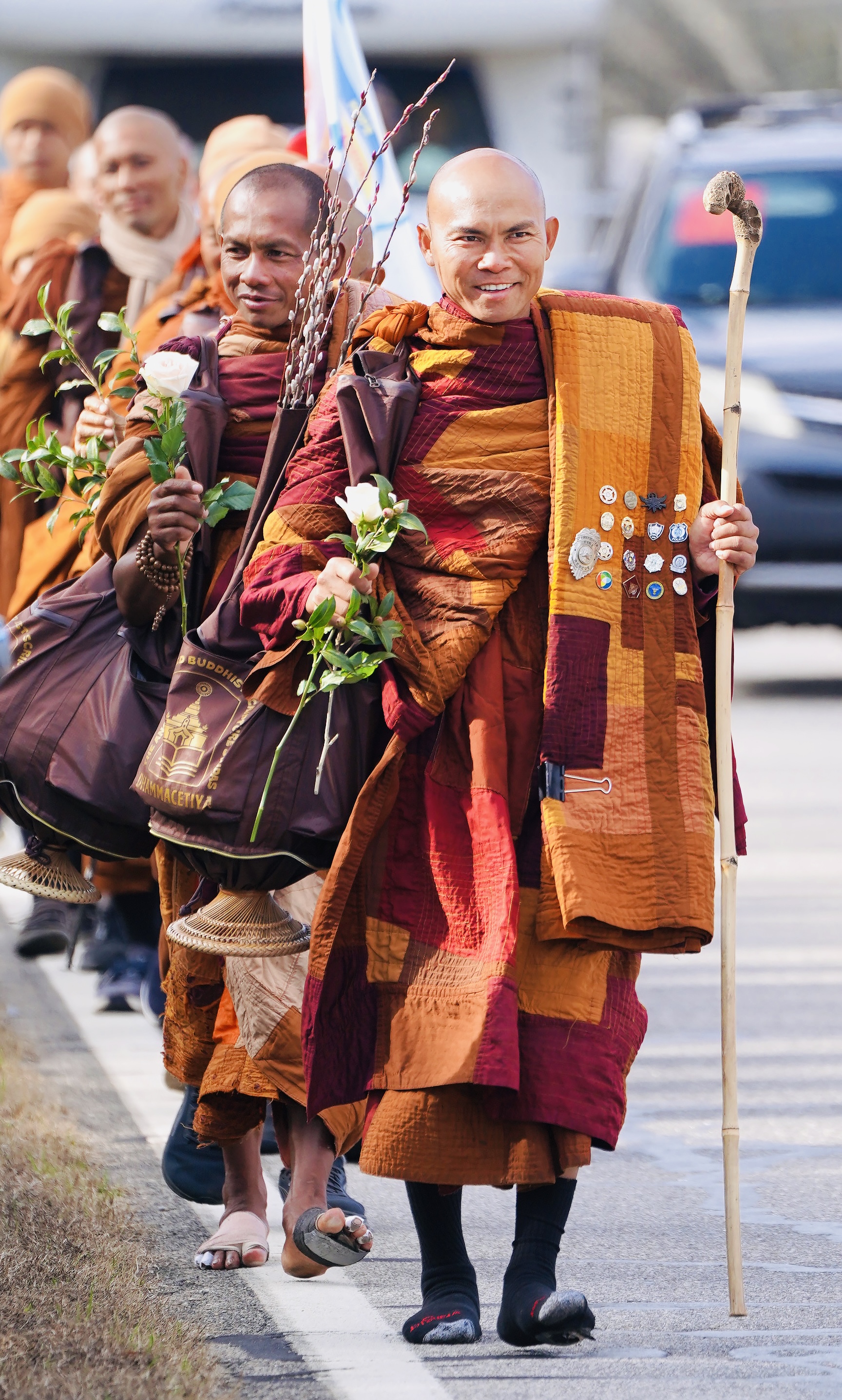 Bhikkhu Paññākāra leads the group of monks through Oglethorpe County on Sunday afternoon. They spent Sunday night at Echo Hill Farm in Lexington before heading to Wilkes County on Monday. (Photo/Steve Colquitt)