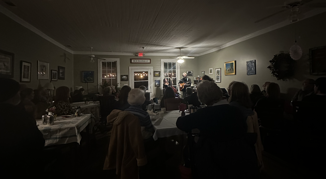 The husband and wife duo Pickled Holler performs their music. Jessica Williams plays upright bass while her husband Matthew plays guitar. (Photo/Izzy Wagner)