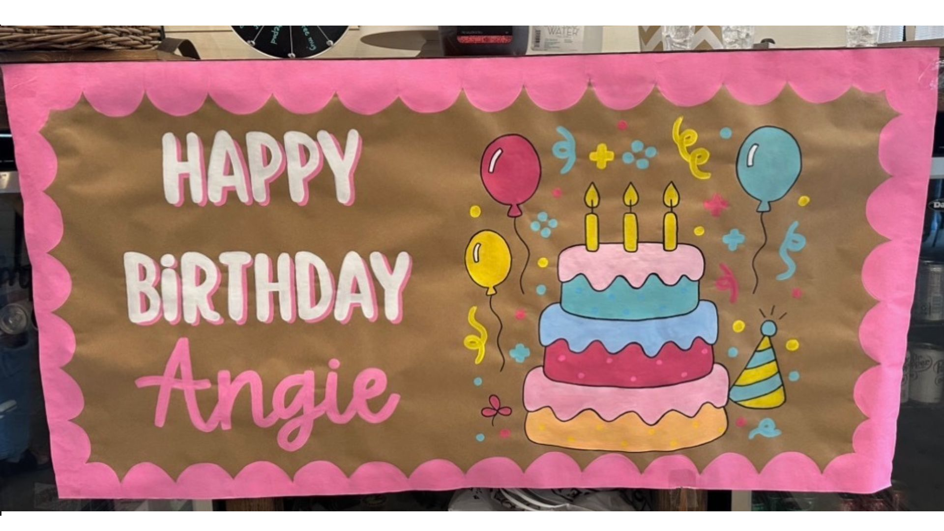 One of Carlie Gabriel’s custom, hand-painted banners, created for Mrs. Dennard’s sister’s surprise birthday party. (Submitted Photo)
