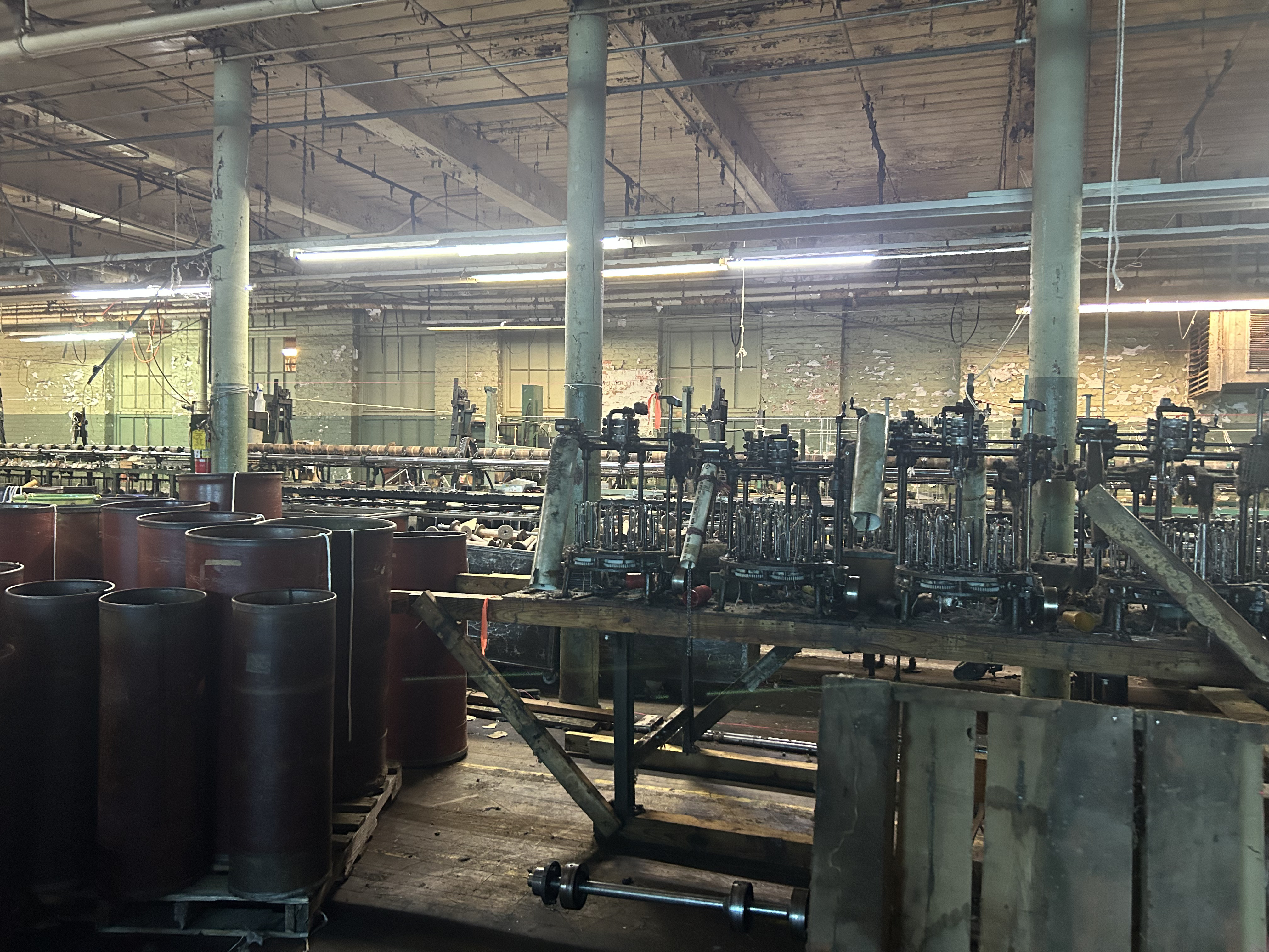 Leftover machinery like rope twisters remain in the factory building from its previous stint as a rope factory. This is part of the Historic Jefferson Mill property in Crawford that went up for sale in October of 2025 for $1.6 million. (Makenna Reavis/The Oglethorpe Echo)