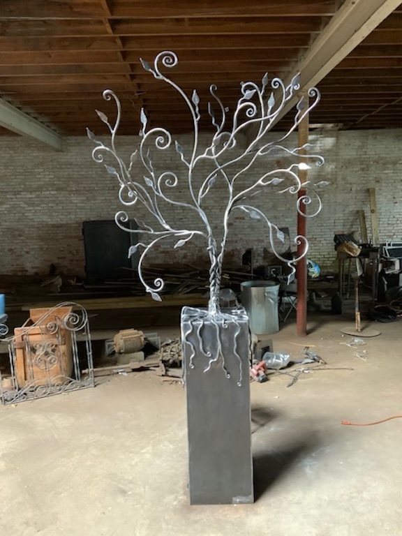 A metal sculpture entitled "Tree of Life" stands in Patrick Blount's blacksmith shop in Washington, Georgia. The piece is now in the chapel at Northside Hospital in Lawrenceville. (Submitted Photo)