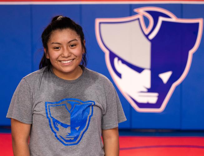 Chelsea Durie, sophomore, poses for a portrait in the wrestling room at Oglethorpe County High School on Nov. 8. (Photo/Sarah White)