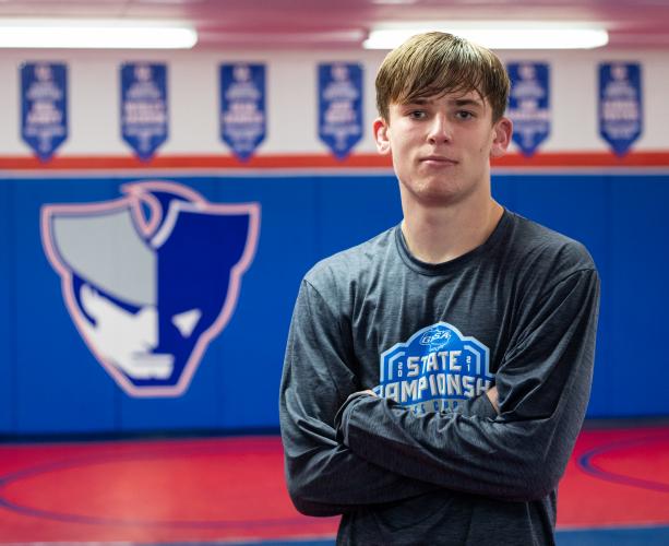 Clay Frost, senior, poses for a photo in the wrestling room at Oglethorpe County High School on Nov. 8. (Photo/Sarah White)