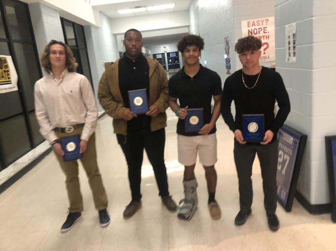 The OCHS football award winners include: Nate Brown (offensive player of the year), KB Bonds (defensive player of the year), Joseph Turner (special teams player of the year) and Logan Turner (5 Pillar Award). (Photo/Ralph Maxwell)
