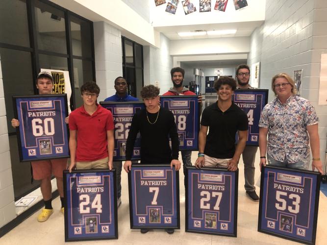 Senior football players include: Logan Steward (60), Tyson Stewart (24), Alex Faust (22), Logan Turner (7), Henry Johnson (18), Nate Brown (27), Peyton Cook (34) and Mason Lee (53). (Submitted Photo/Ralph Maxwell)