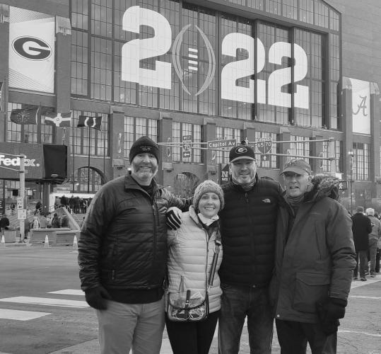 Members of Blake Giles’ family and a few friends rented a house near Indianapolis and bought tickets to watch Georgia’s 33-18 win over Alabama in the national championship game. They are (from left): Josh Garrett, Laura Garrett, John Giles and Blake Giles. (Submitted Photo)