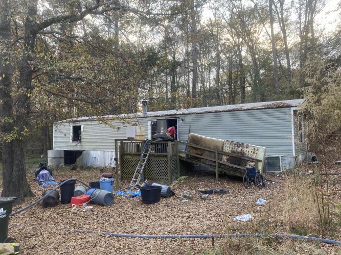 Authorities are investigating the cause of the fire at 115 Upson Court in Lexington on Sunday. A deputy pulled Jeffrey Shellnut and his dog from the fire. (Submitted Photo)