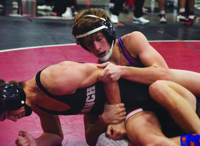 Oglethorpe County's Garret Gilreath gains the upper hand in the Panther Invitational at Jackson County. (Photo/Ralph Maxwell)