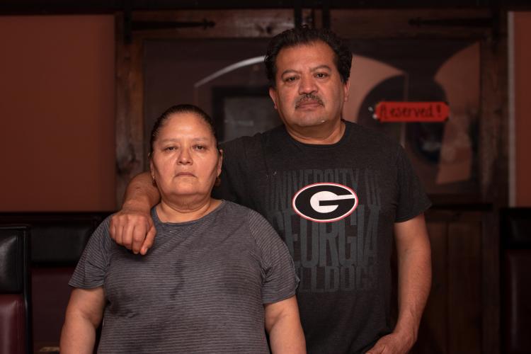 Josefina (left) and Jose Luis (right), owners of Taco’s Mexican Food, pose for a portrait inside their  restaurant in Lexington, Georgia on Feb. 15, 2022. (Julia Walkup/Oglethorpe Echo)