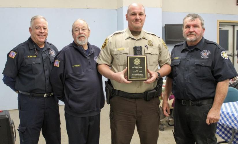 (Submitted Photo/Cody Gibbs) From left to right: Deputy Department Chief Rocky Miller, Department Chief Carl Young, Sgt. Andrew Brooks, Chief Jehu Post.