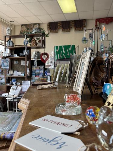 Local Color, owned by Linda Parish, offers a variety of home decor gifts, antiques, and one-of-a-kind pieces. Parishlind has owned Local Color for over a decade and has noticed changes in the business landscape over the years. (Colt Yeargin/Oglethorpe Echo)